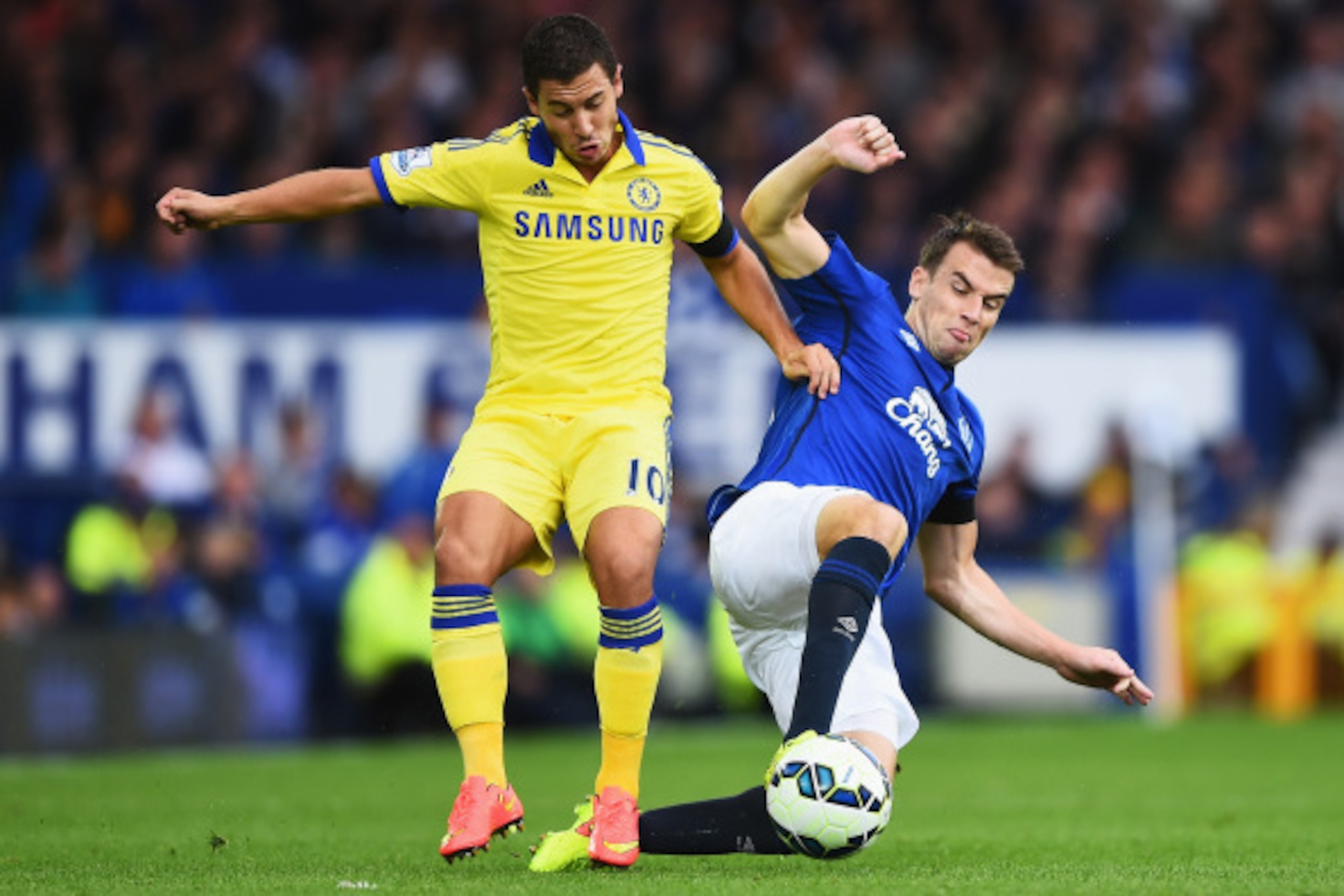 LIVERPOOL, ENGLAND - AUGUST 30:  Eden Hazard of Chelsea is tackled by Seamus Coleman of Everton during the Barclays Premier League match between Everton and Chelsea at Goodison Park on August 30, 2014 in Liverpool, England.  (Photo by Laurence Griffiths/G