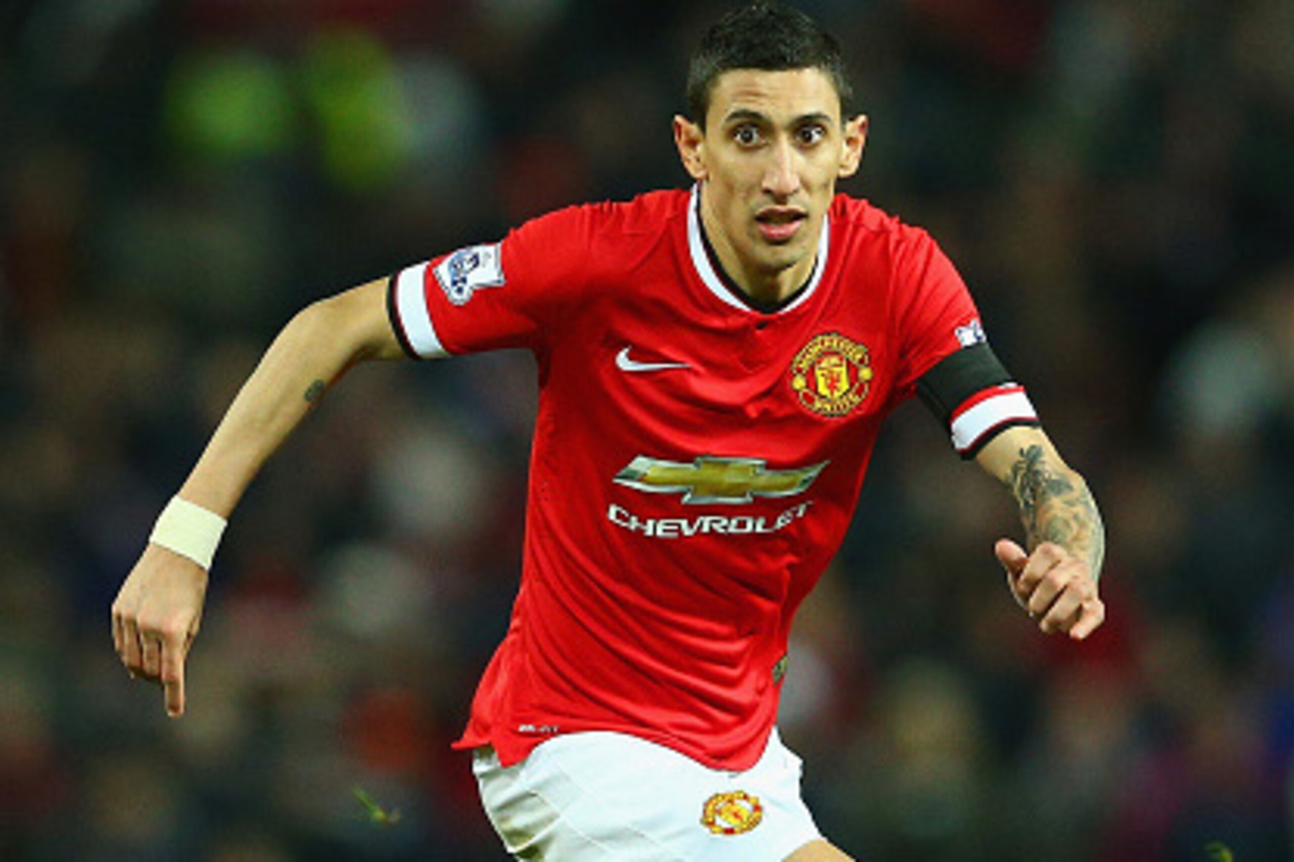 MANCHESTER, ENGLAND - FEBRUARY 03:  Angel di Maria of Manchester United on the ball during the FA Cup Fourth round replay match between Manchester United and Cambridge United at Old Trafford on February 3, 2015 in Manchester, England.  (Photo by Clive Mas