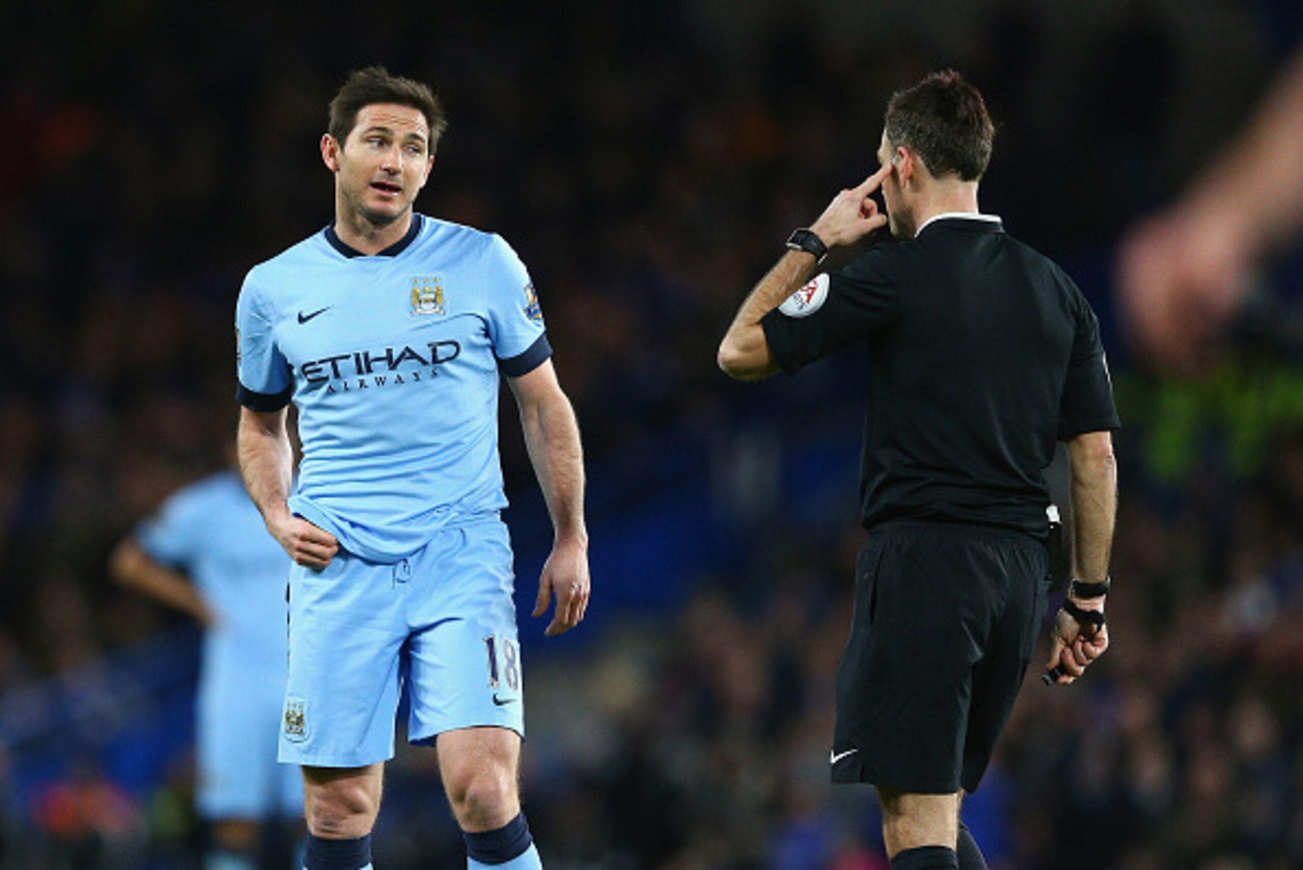 LONDON, ENGLAND - JANUARY 31:  Frank Lampard of Manchester City talks with referee Mark Clattenburg during the Barclays Premier League match between Chelsea and Manchester City at Stamford Bridge on January 31, 2015 in London, England.  (Photo by Clive Ma