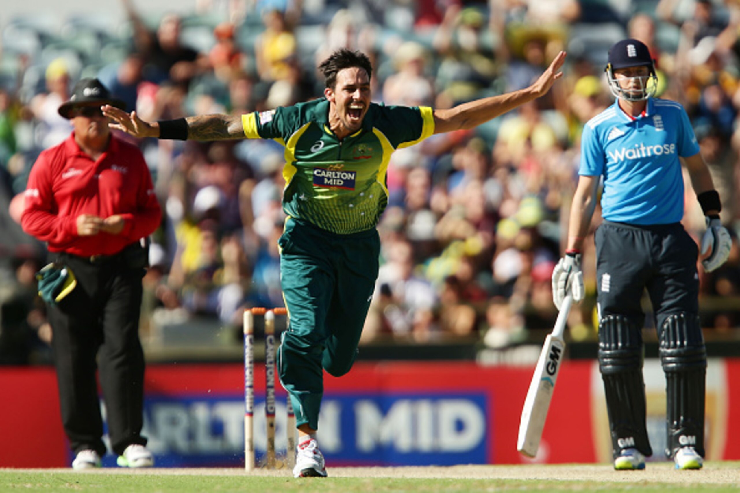 PERTH, AUSTRALIA - FEBRUARY 01:  Mitchell Johnson of Australia celebrates taking the wicket of Eoin Morgan of England during the final match of the Carlton Mid One Day International series between Australia and England at WACA on February 1, 2015 in Perth