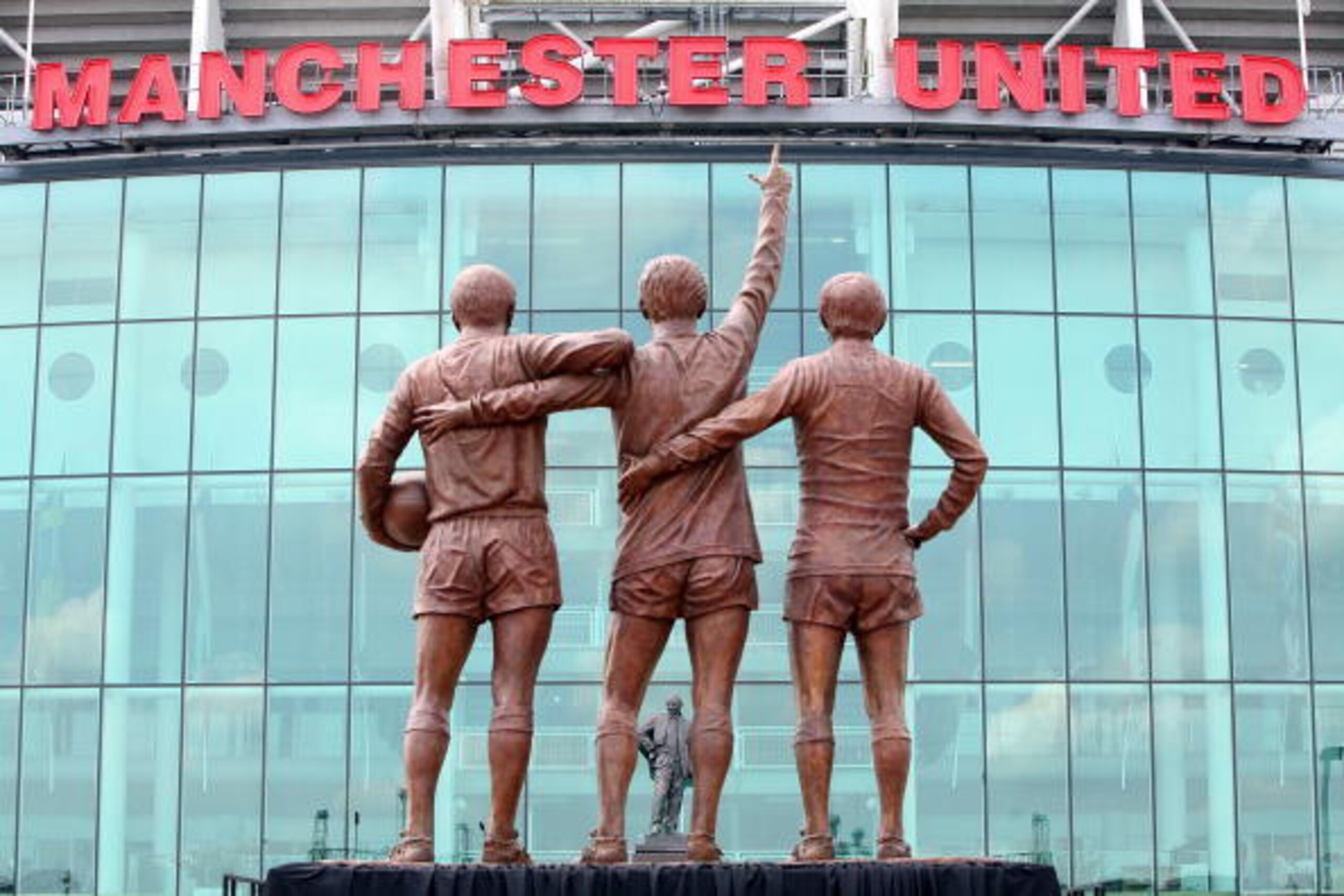 MANCHESTER, UNITED KINGDOM - MAY 29:  The statue of Manchester United's 'Holy Trinity' of players stands in front of Old Trafford and the Matt Busby statue after being unveiled today on May 29, 2008, Manchester, England. The statue of United legends Bobby