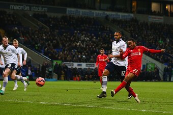 BOLTON, ENGLAND - FEBRUARY 04:  Raheem Sterling of Liverpool scores their first goal during the FA Cup Fourth round replay between Bolton Wanderers and Liverpool at Macron Stadium on February 4, 2015 in Bolton, England.  (Photo by Michael Steele/Getty Ima