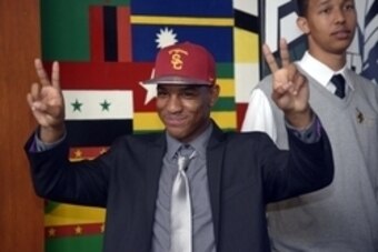 Feb 4, 2015; Long Beach, CA, USA; Long Beach Poly High Jackrabbits cornerback Inman Marshall (left) poses wtih basketball player Jordan Dallas after announcing his decision to attend the University of Southern California at press conference at Long Beach 
