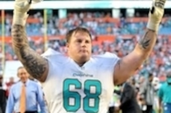 Sep 22, 2013; Miami Gardens, FL, USA; Miami Dolphins guard Richie Incognito (68) celebrates their win over the Atlanta Falcons at Sun Life Stadium. Mandatory Credit: Steve Mitchell-USA TODAY Sports