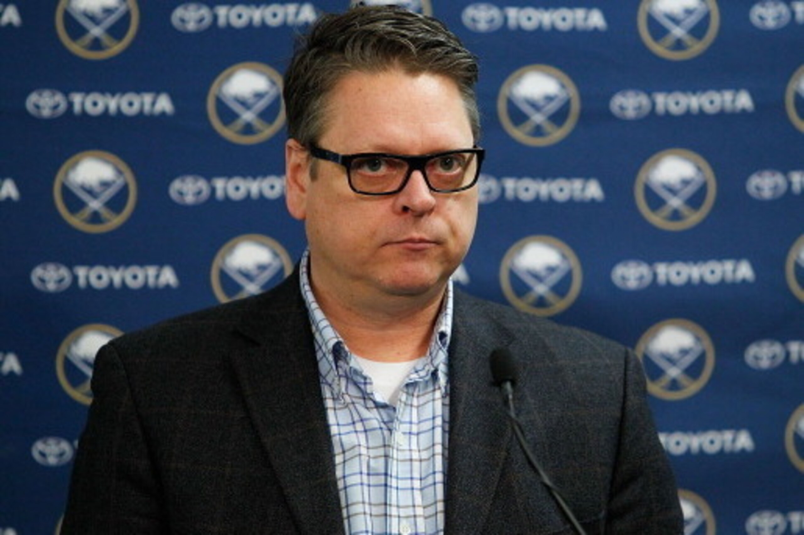 BUFFALO, NY - FEBRUARY 28: General manager Tim Murray of the Buffalo Sabres speaks to the media follwing the trade of Ryan Miller and Steve Ott on February 28, 2014 at the First Niagara Center in Buffalo, New York.  (Photo by Bill Wippert/NHLI via Getty I