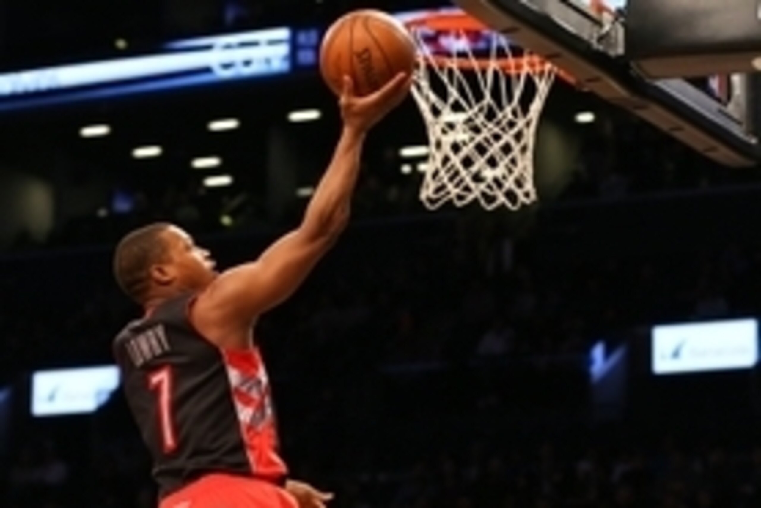 Jan 30, 2015; Brooklyn, NY, USA; Toronto Raptors guard Kyle Lowry (7) at the net to score during the first quarter against the Brooklyn Nets  at Barclays Center. Mandatory Credit: Anthony Gruppuso-USA TODAY Sports