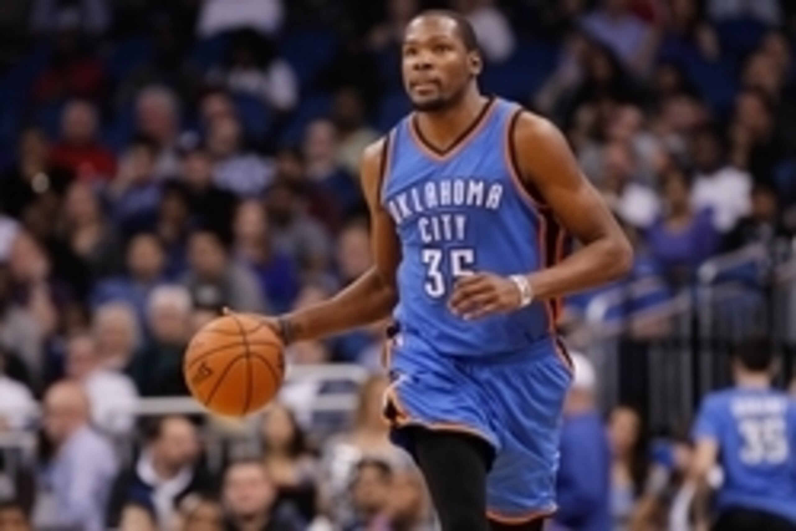 Jan 18, 2015; Orlando, FL, USA; Oklahoma City Thunder forward Kevin Durant (35) drives to the basket against the Orlando Magic during the second quarter at Amway Center. Mandatory Credit: Kim Klement-USA TODAY Sports