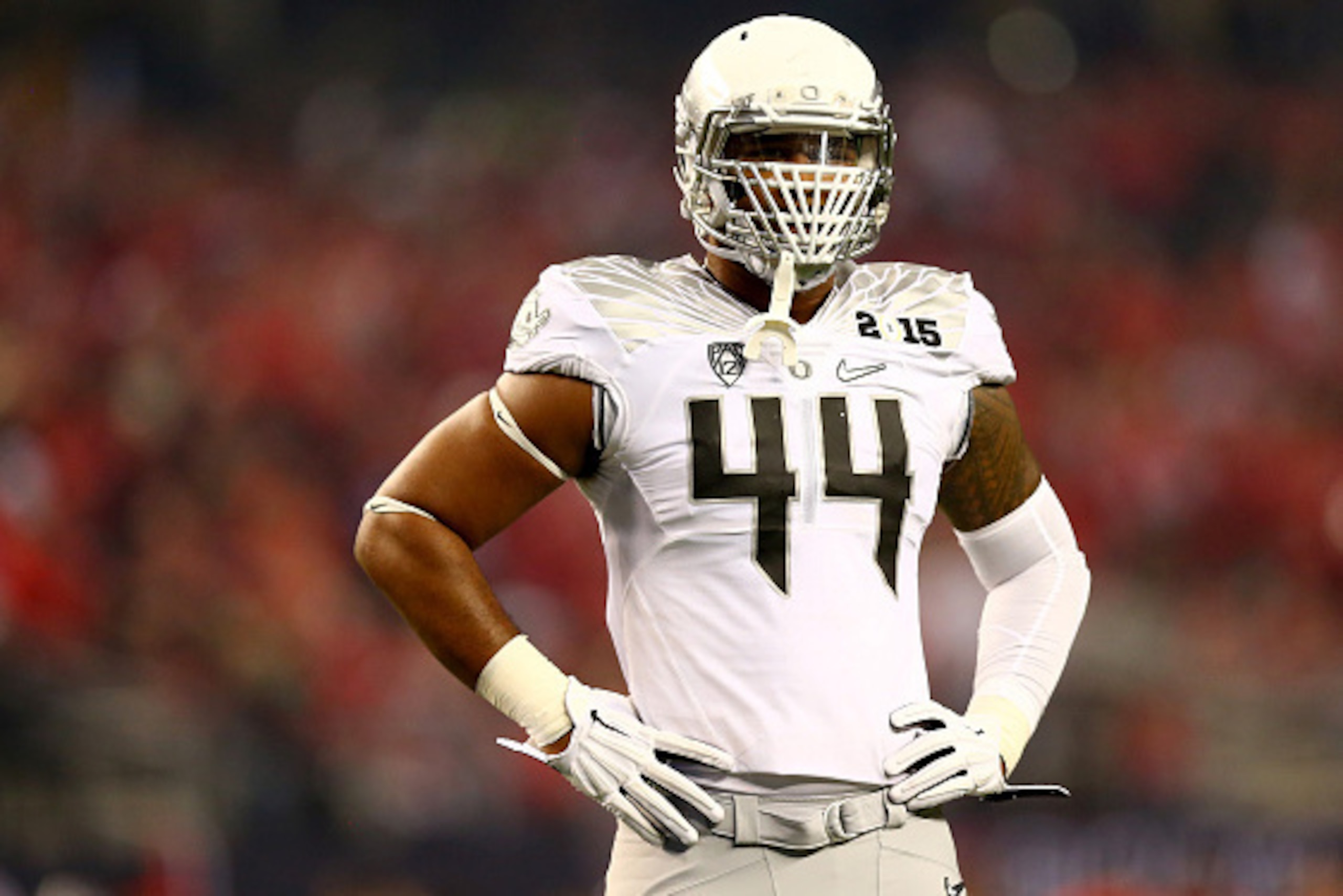 ARLINGTON, TX - JANUARY 12:  Defensive lineman DeForest Buckner #44 of the Oregon Ducks looks on in the first half during the College Football Playoff National Championship Game at AT&T Stadium on January 12, 2015 in Arlington, Texas.  (Photo by Ronald Ma