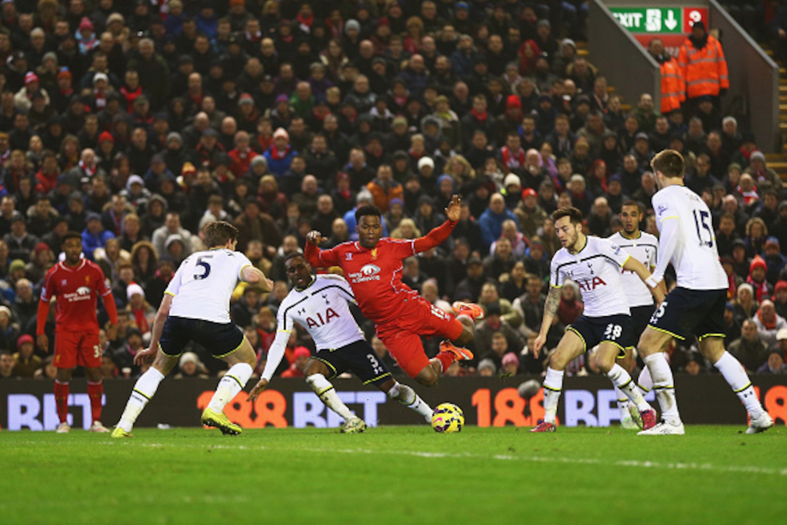 LIVERPOOL, ENGLAND - FEBRUARY 10:  Daniel Sturridge of Liverpool is brought down by Danny Rose of Tottenham Hotspur leading to a penalty during the Barclays Premier League match between Liverpool and Tottenham Hotspur at Anfield on February 10, 2015 in Li