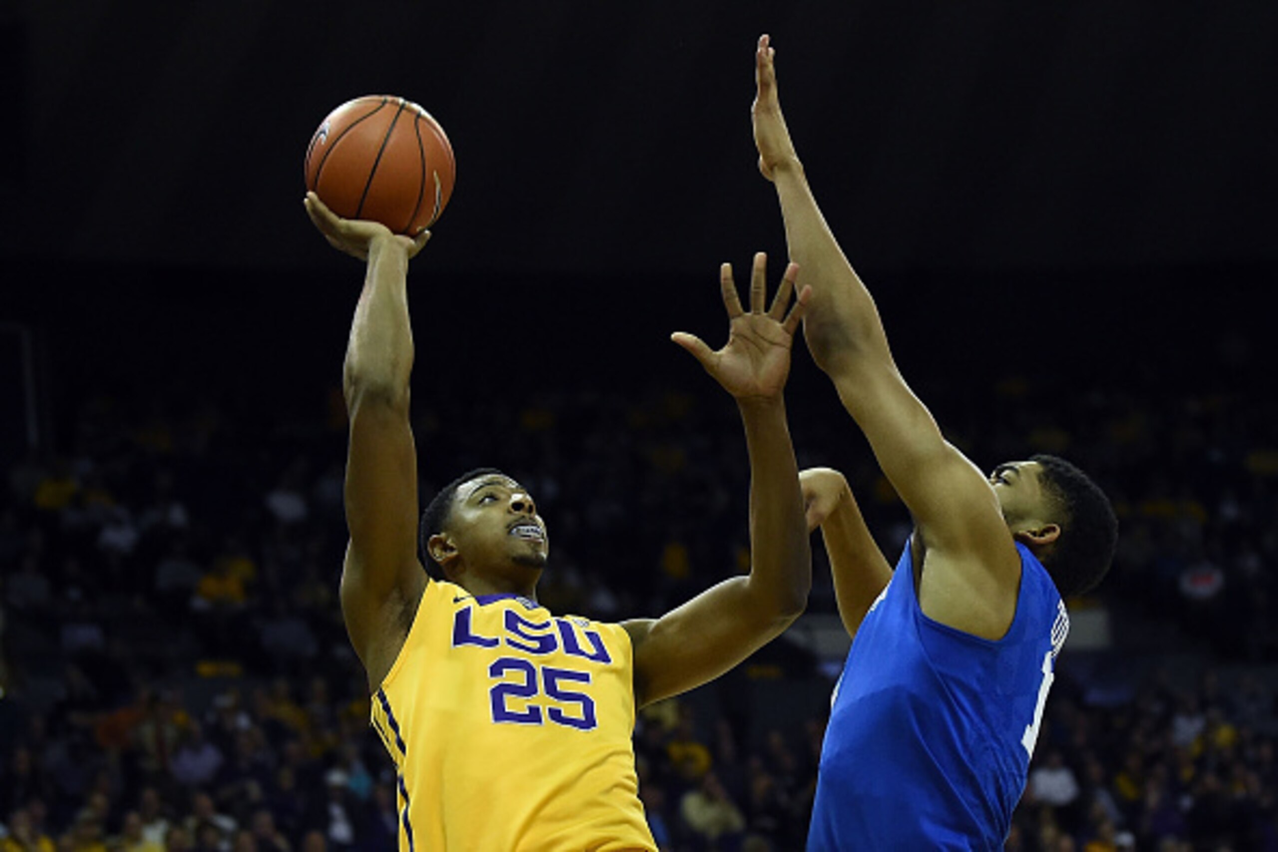 BATON ROUGE, LA - FEBRUARY 10:  Jordan Mickey #25 of the LSU Tigers shoots over Karl-Anthony Towns #12 of the Kentucky Wildcats during the first half of a game at the Pete Maravich Assembly Center on February 10, 2015 in Baton Rouge, Louisiana.  (Photo by