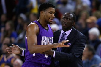 OAKLAND, CA - DECEMBER 22:  Head coach Tyrone Corbin of the Sacramento Kings talks to Rudy Gay #8 during their game against the Golden State Warriors at ORACLE Arena on December 22, 2014 in Oakland, California. NOTE TO USER: User expressly acknowledges an