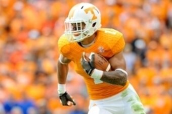 Oct 4, 2014; Knoxville, TN, USA; Tennessee Volunteers running back Jalen Hurd (1) runs the ball against the Florida Gators during the second quarter at Neyland Stadium. Mandatory Credit: Randy Sartin-USA TODAY Sports