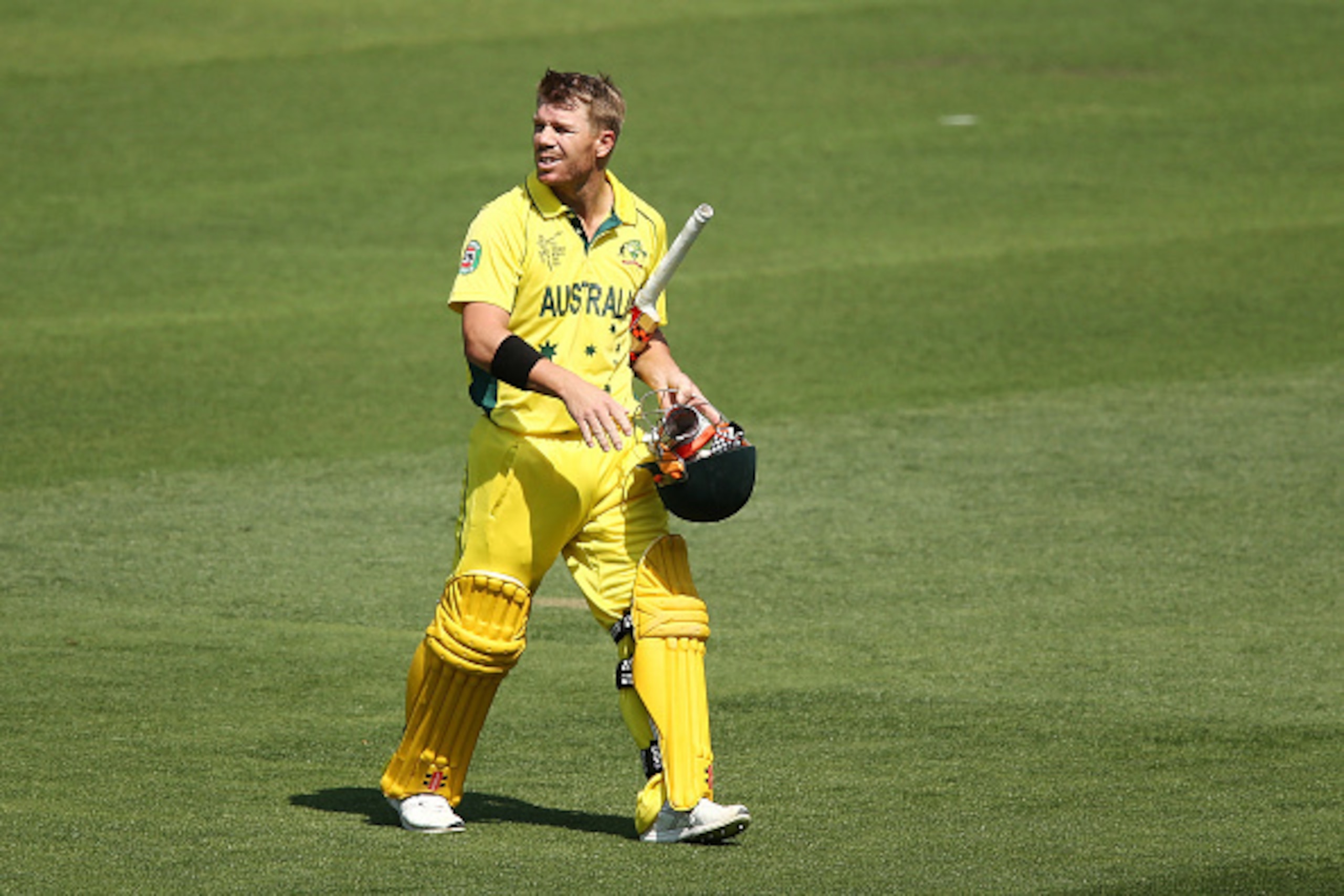 ADELAIDE, AUSTRALIA - FEBRUARY 08: David Warner of Australia leaves the field after getting out to Axar Patel of India during the ICC Cricket World Cup warm up match between Australia and India at Adelaide Oval on February 8, 2015 in Adelaide, Australia. 