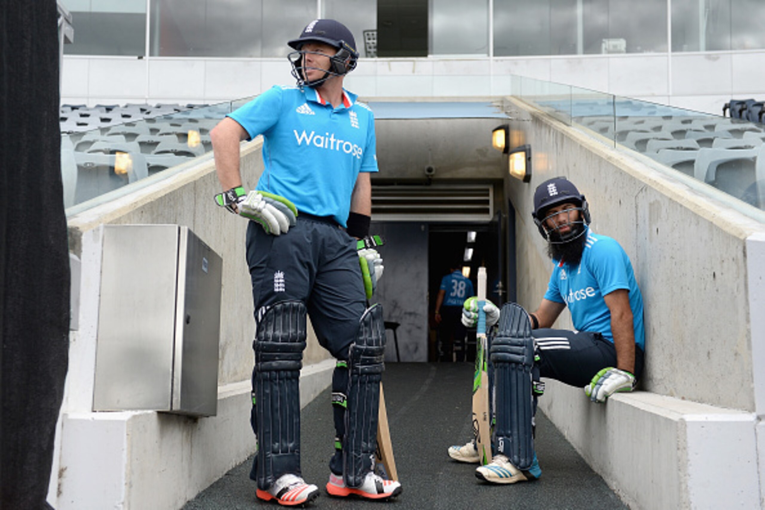 CANBERRA, AUSTRALIA - JANUARY 12:  Ian Bell and Moeen Ali of England prepare to walk out to bat ahead of the one day tour match between the ACT XI and England at Manuka Oval on January 12, 2015 in Canberra, Australia.  (Photo by Gareth Copley/Getty Images