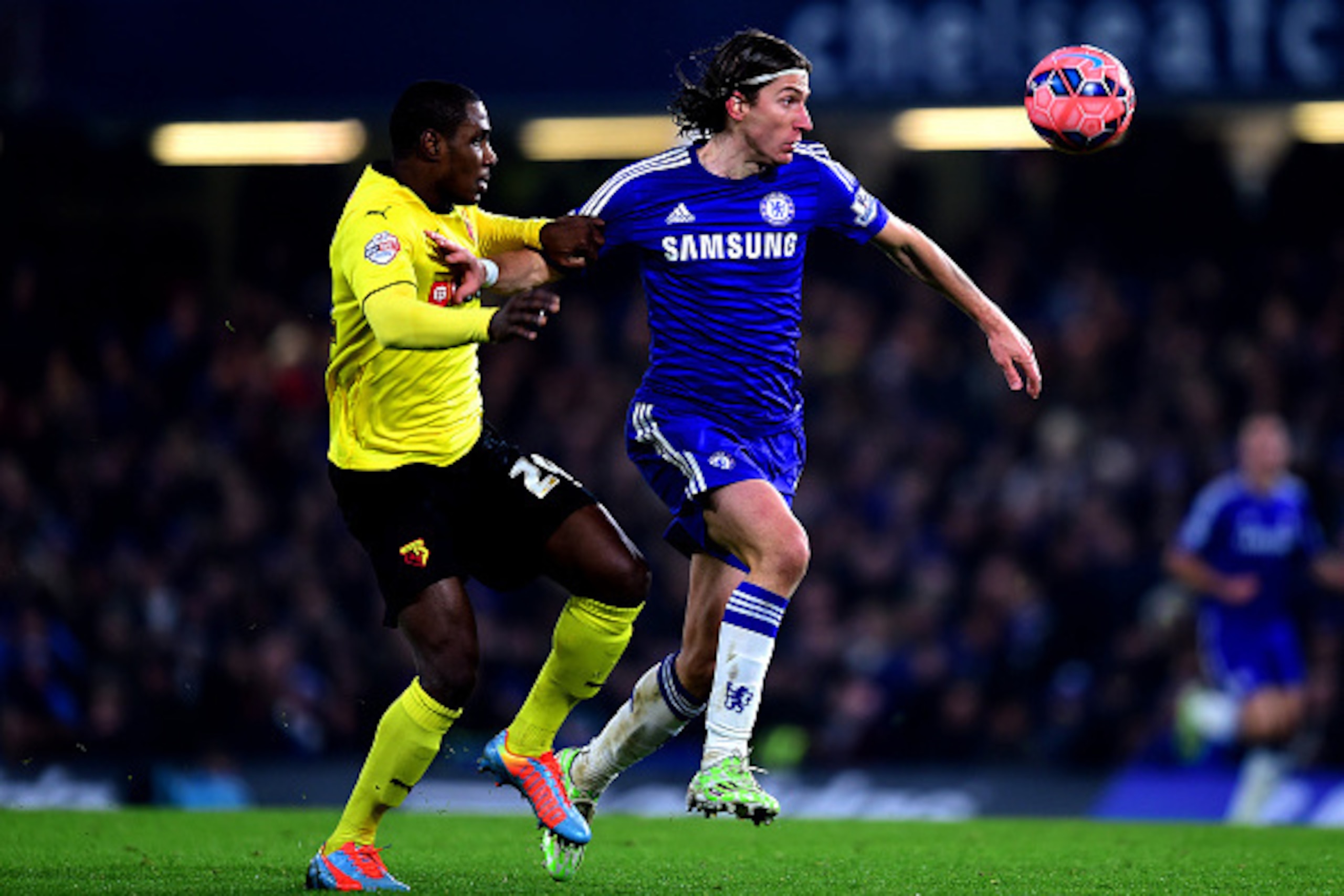 LONDON, ENGLAND - JANUARY 04: Filipe Luis of Chelsea holds off Odion Ighalo of Watford during the FA Cup Third Round match between Chelsea and Watford at Stamford Bridge on January 4, 2015 in London, England. (Photo by Jamie McDonald/Getty Images) LONDON, ENGLAND - JANUARY 04: Filipe Luis of Chelsea holds off Odion Ighalo of Watford during the FA Cup Third Round match between Chelsea and Watford at Stamford Bridge on January 4, 2015 in London, England. (Photo by Jamie McDonald/Getty Images)