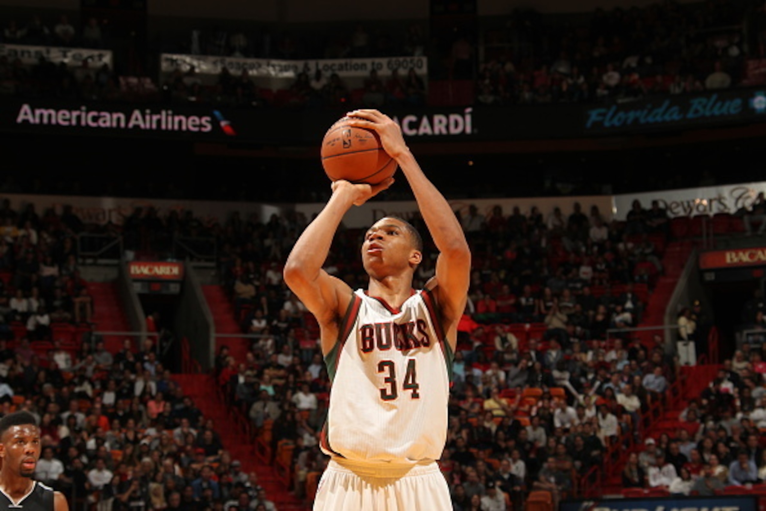 MIAMI, FL - JANUARY 27:  Giannis Antetokounmpo #34 of the Milwaukee Bucks prepares to shoot a free throw against the Miami Heat on January 27, 2015  at American Airlines Arena in Miami, Florida.  NOTE TO USER: User expressly acknowledges and agrees that, 