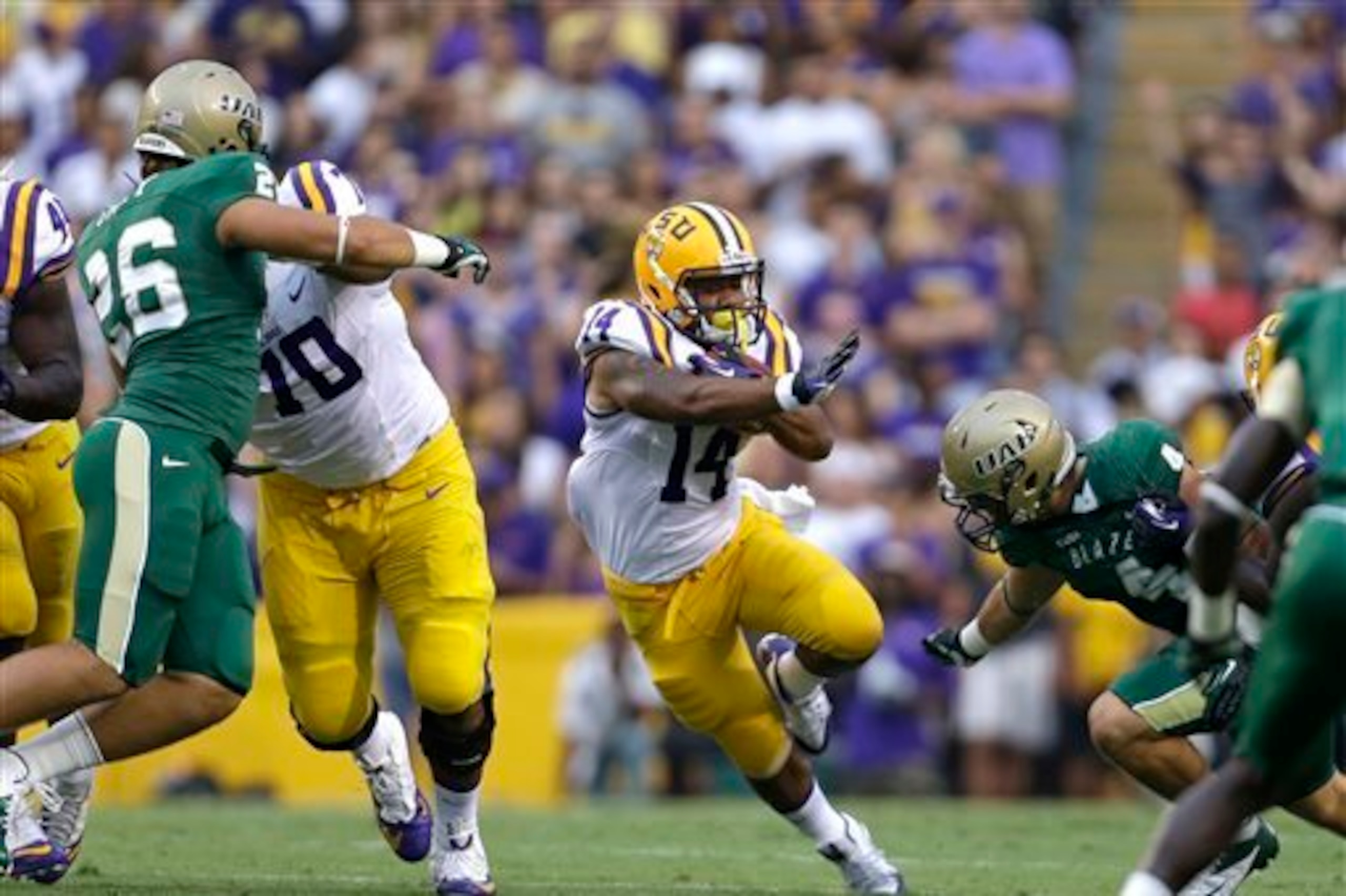Ganus dives at an LSU runner. Ganus dives at an LSU runner.