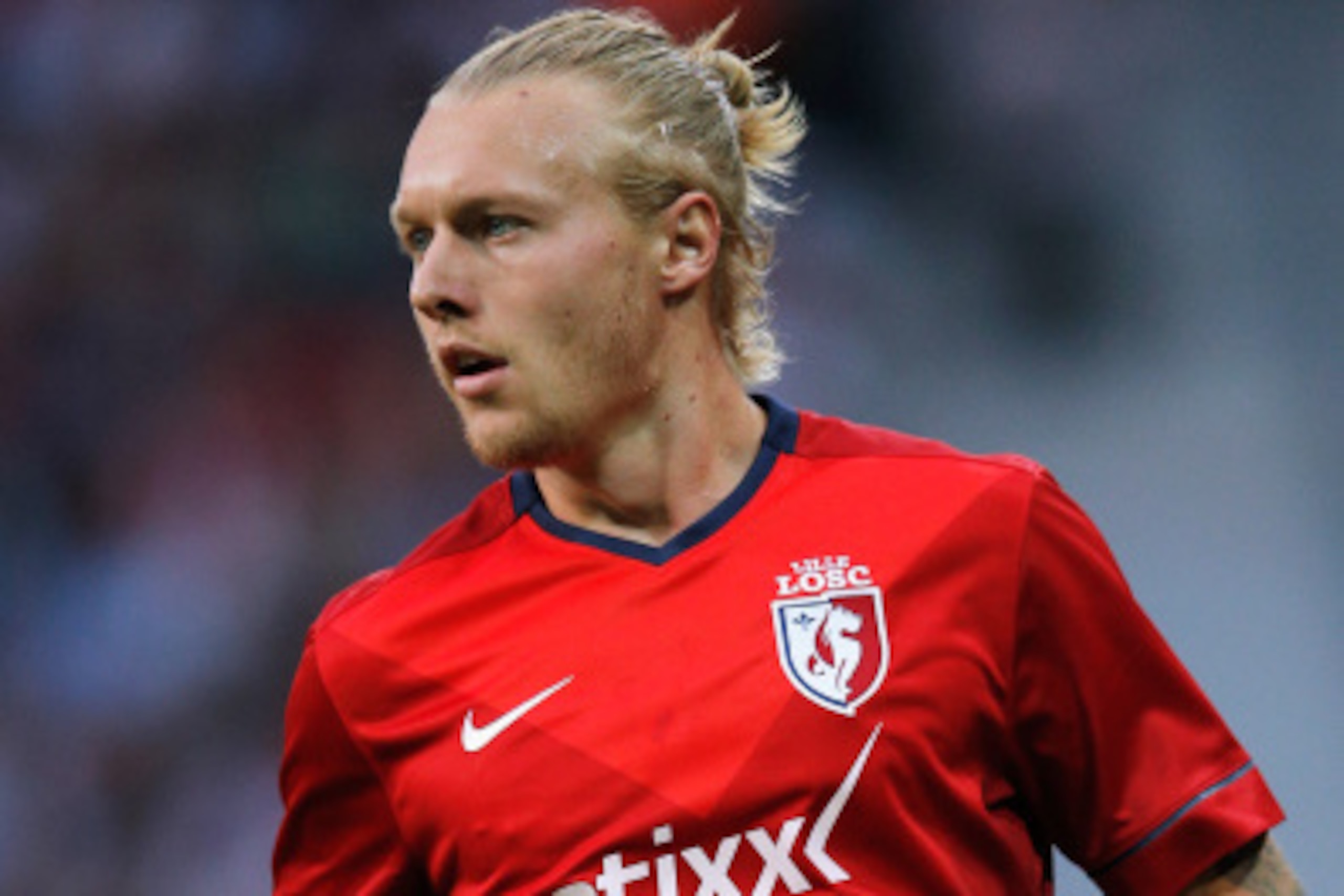 LILLE, FRANCE - AUGUST 05: Simon Kjaer of Lille in action during the UEFA Champions League third qualifying round 2nd leg match between LOSC Lille and Grasshopper Club Zurich at the Stade Pierre-Mauroy on August 5, 2014 in Lille, France. (Photo by Dean LILLE, FRANCE - AUGUST 05: Simon Kjaer of Lille in action during the UEFA Champions League third qualifying round 2nd leg match between LOSC Lille and Grasshopper Club Zurich at the Stade Pierre-Mauroy on August 5, 2014 in Lille, France. (Photo by Dean