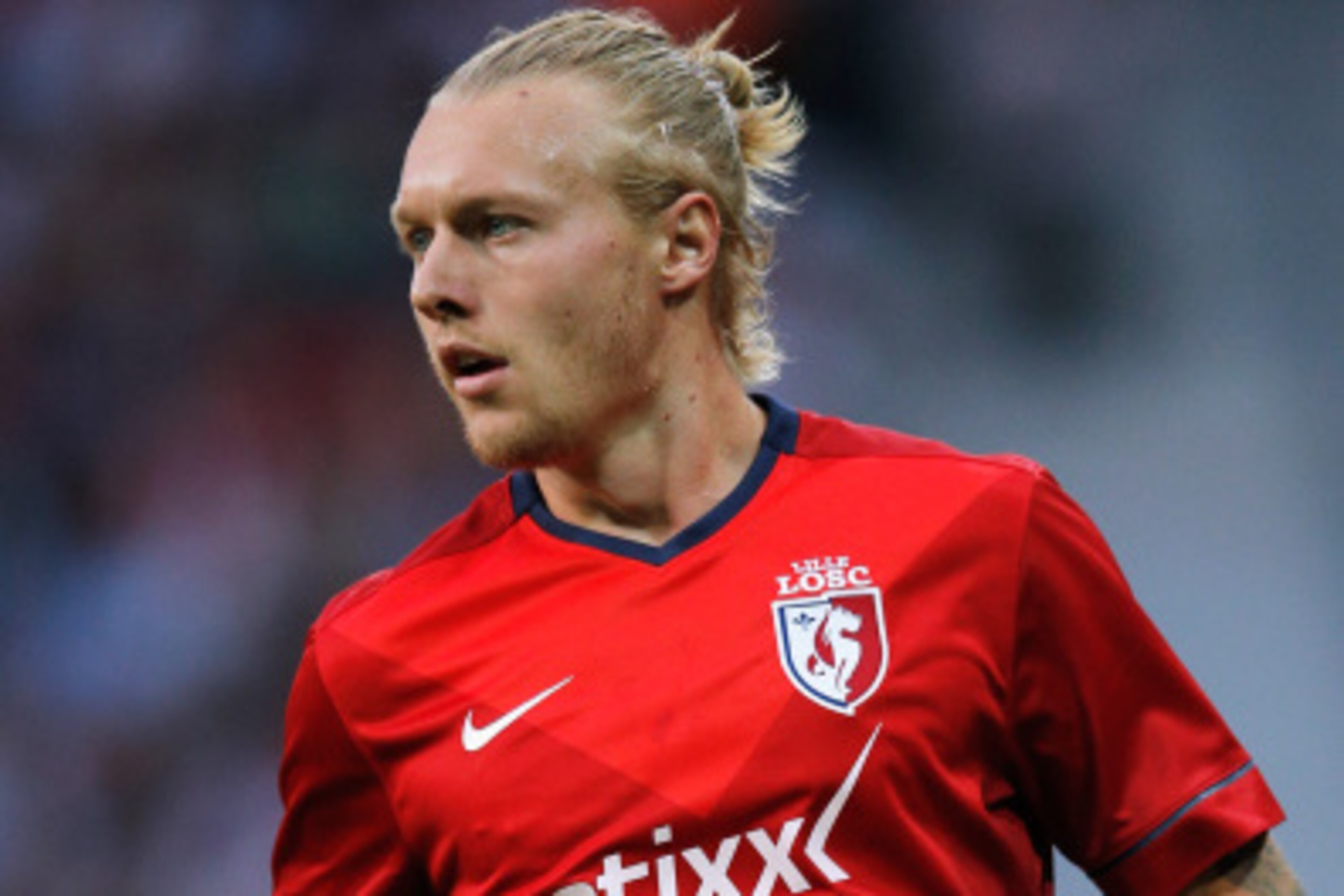 LILLE, FRANCE - AUGUST 05:  Simon Kjaer of Lille in action during the UEFA Champions League third qualifying round 2nd leg match between LOSC Lille and Grasshopper Club Zurich at the Stade Pierre-Mauroy on August 5, 2014 in Lille, France.  (Photo by Dean 