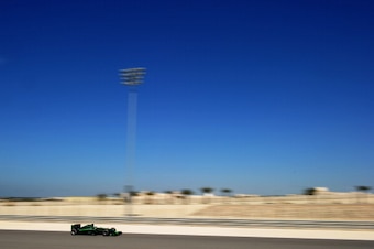 BAHRAIN, BAHRAIN - MARCH 02:  Kamui Kobayashi of Japan and Caterham drives during day four of Formula One Winter Testing at the Bahrain International Circuit on March 2, 2014 in Bahrain, Bahrain.  (Photo by Shaun Botterill/Getty Images)