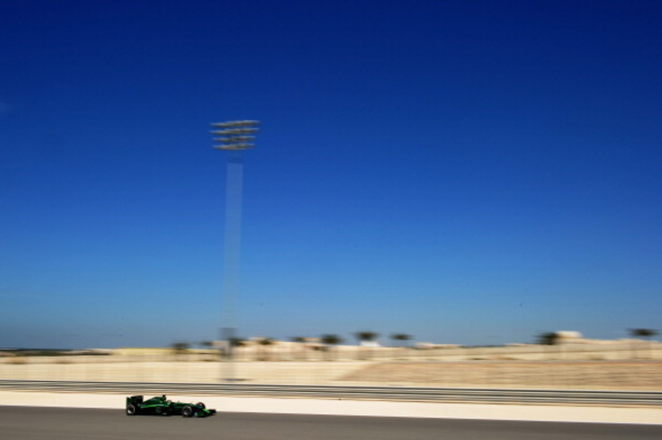 BAHRAIN, BAHRAIN - MARCH 02:  Kamui Kobayashi of Japan and Caterham drives during day four of Formula One Winter Testing at the Bahrain International Circuit on March 2, 2014 in Bahrain, Bahrain.  (Photo by Shaun Botterill/Getty Images)