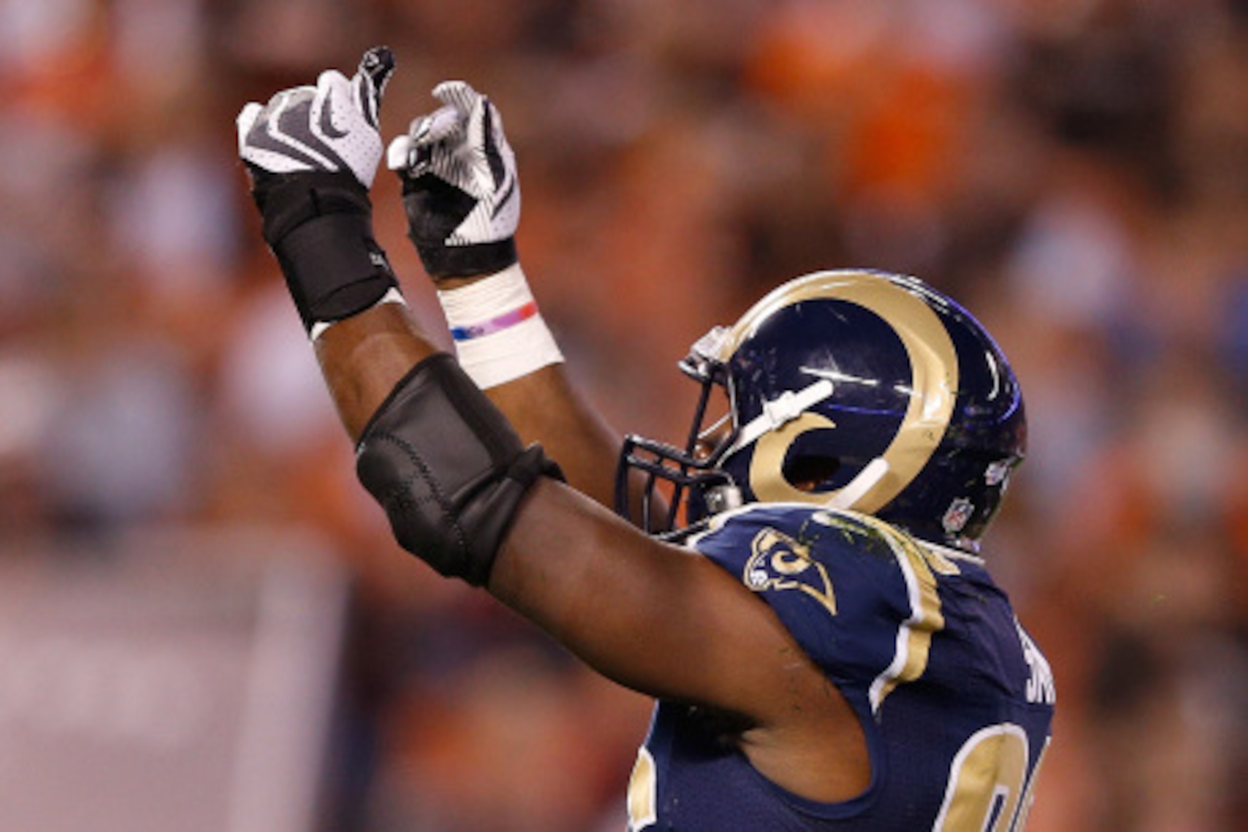 CLEVELAND, OH - AUGUST 23:  Michael Sam #96 of the St. Louis Rams reacts after sacking Johnny Manziel #2 of the Cleveland Browns during the fourth quarter at FirstEnergy Stadium on August 23, 2014 in Cleveland, Ohio.  (Photo by Joe Robbins/Getty Images)
