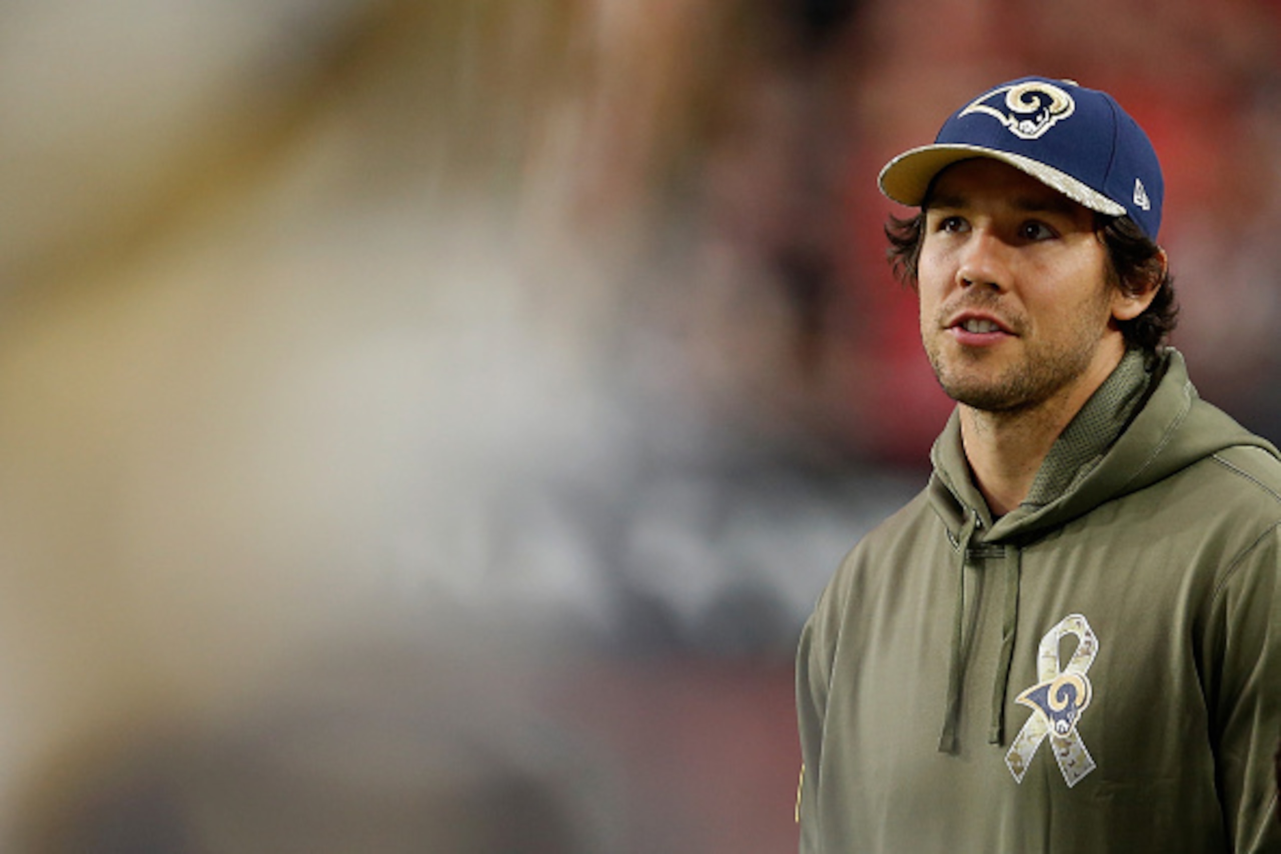 GLENDALE, AZ - NOVEMBER 09:  Quarterback Sam Bradford #8 of the St. Louis Rams watches the NFL game against the Arizona Cardinals from the sidelines at the University of Phoenix Stadium on November 9, 2014 in Glendale, Arizona.  (Photo by Christian Peters