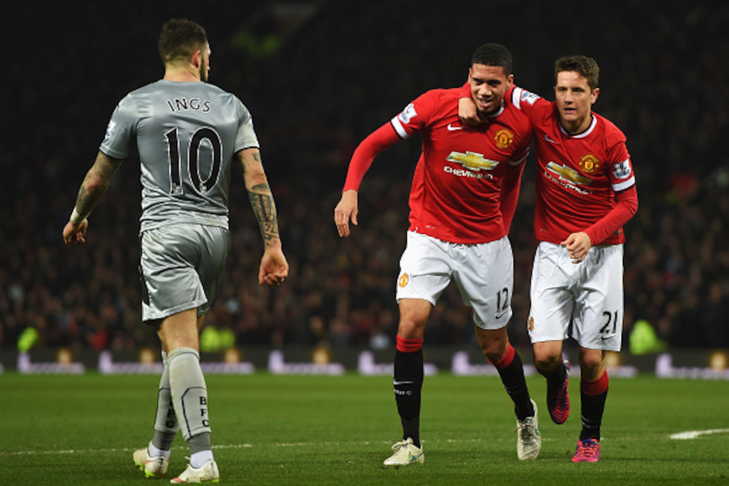 MANCHESTER, ENGLAND - FEBRUARY 11: Chris Smalling of Manchester United celebrates scoring his second goal with Ander Herrera of Manchester United during the Barclays Premier League match between Manchester United and Burnley at Old Trafford on February 1 MANCHESTER, ENGLAND - FEBRUARY 11: Chris Smalling of Manchester United celebrates scoring his second goal with Ander Herrera of Manchester United during the Barclays Premier League match between Manchester United and Burnley at Old Trafford on February 1