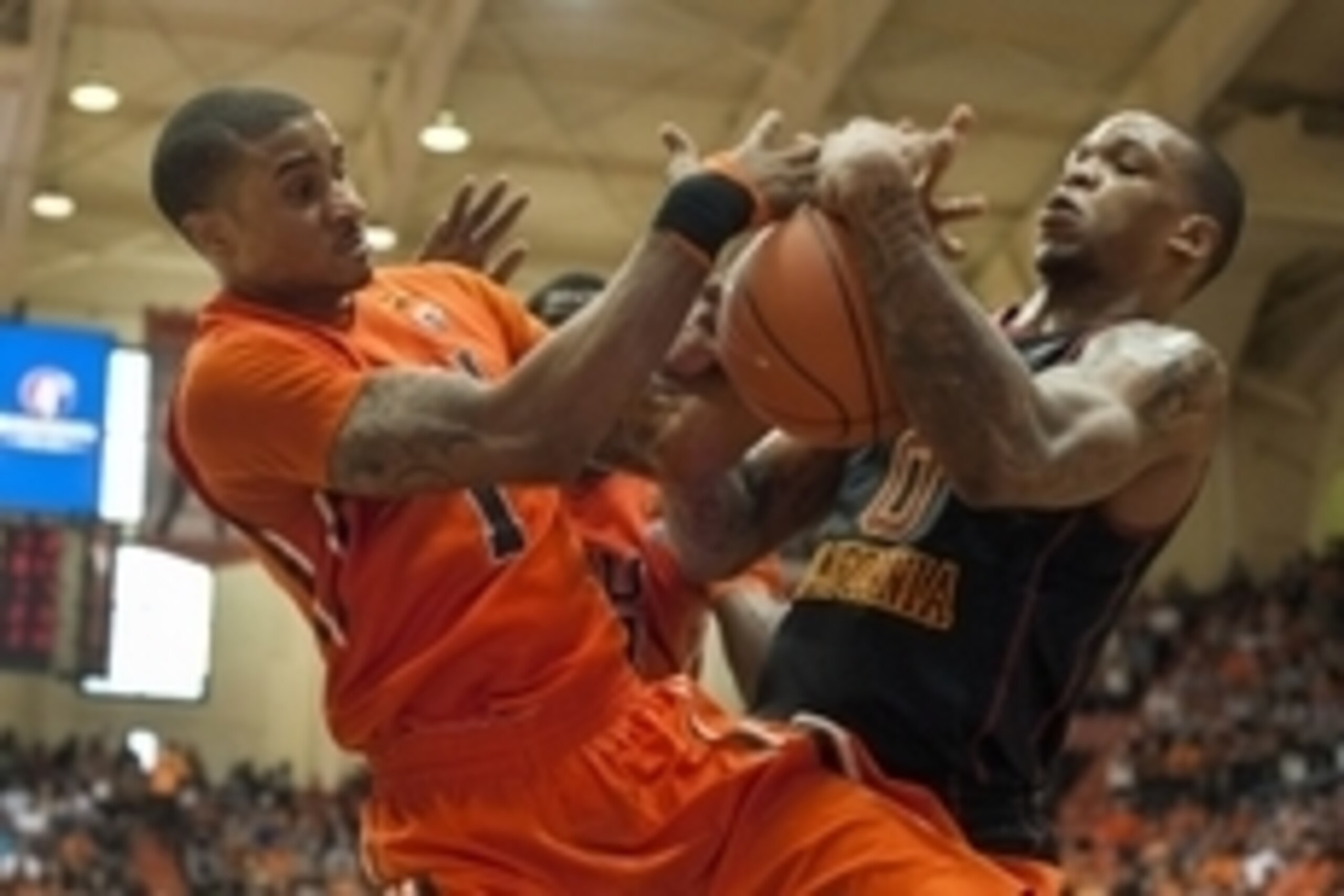 Jan 24, 2015; Corvallis, OR, USA; Oregon State Beavers guard Gary Payton II (left) and USC Trojans forward Darion Clark (right) tussle for control of the ball during the second half of the game at Gill Coliseum. The Beavers won 59-55. Mandatory Credit: Go
