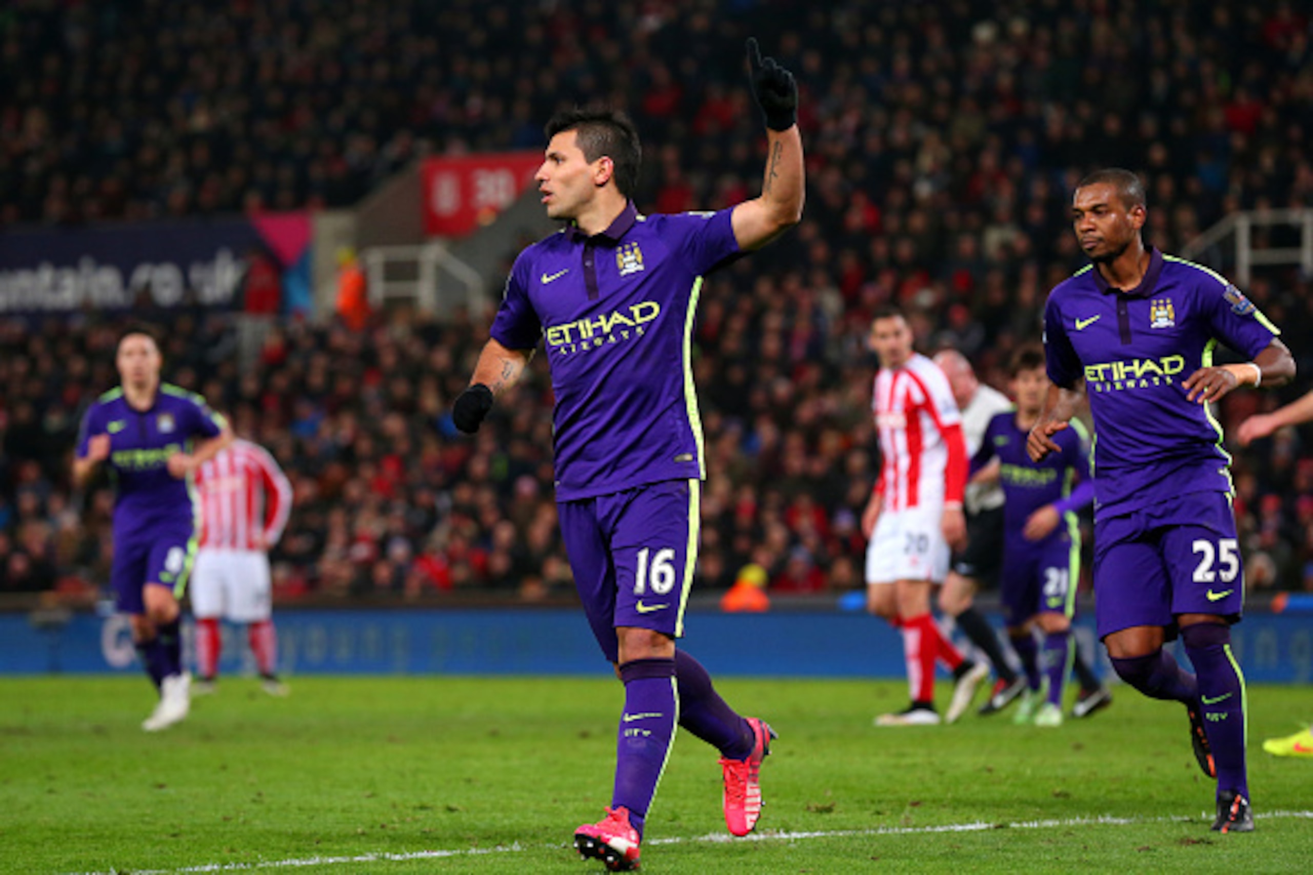 STOKE ON TRENT, ENGLAND - FEBRUARY 11:  Sergio Aguero of Manchester City celebrates after scoring his team's third goal from the penalty spot during the Barclays Premier League match between Stoke City and Manchester City at Britannia Stadium on February 