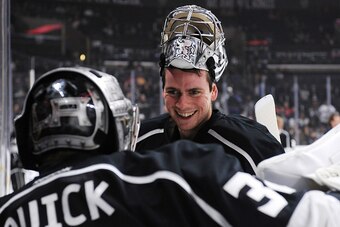 LOS ANGELES, CA - JANUARY 14: Martin Jones #31 converses with Jonathan Quick #32 of the Los Angeles Kings before a game against the New Jersey Devils at STAPLES Center on January 14, 2015 in Los Angeles, California. (Photo by Juan Ocampo/NHLI via Getty Im