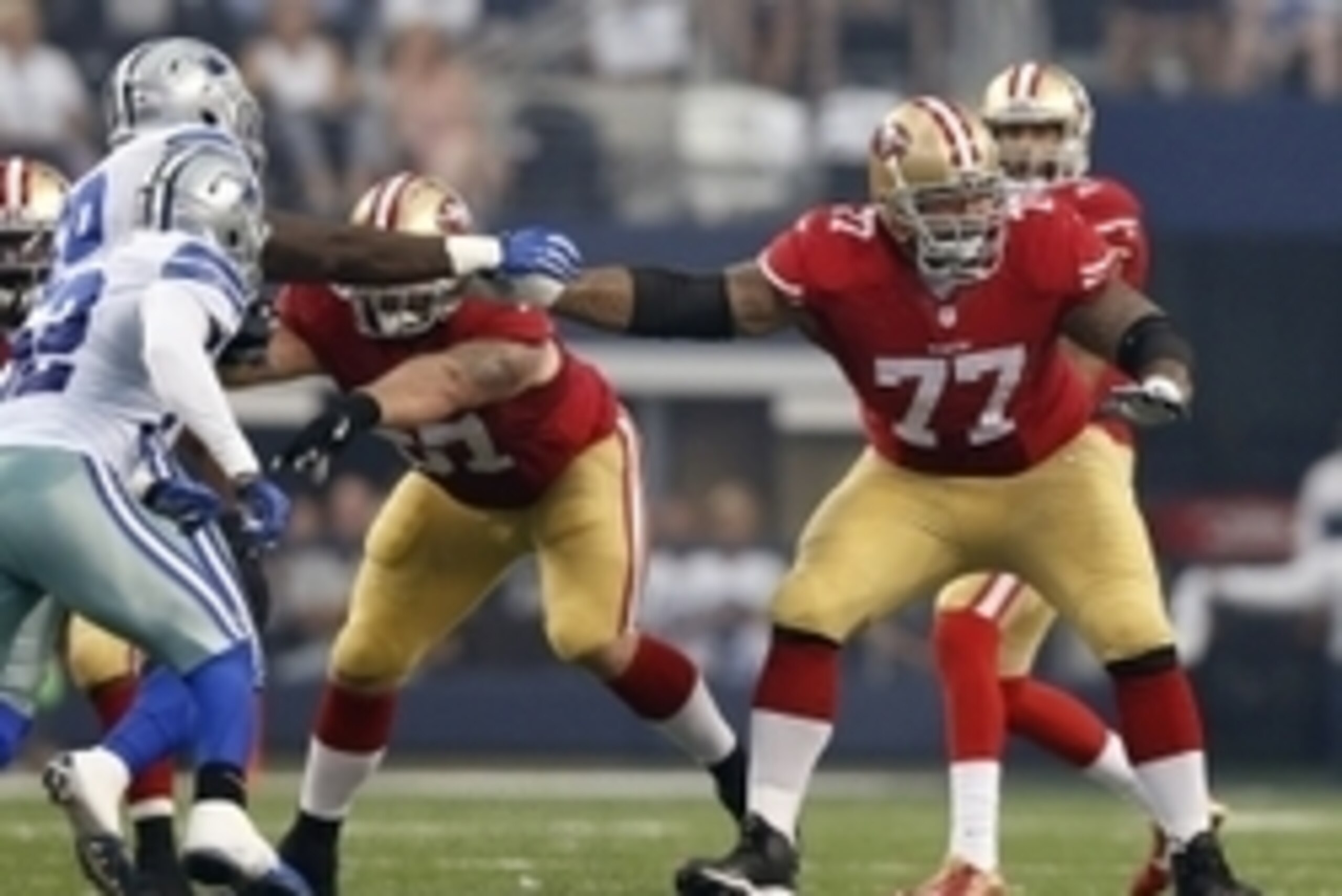 Sep 7, 2014; Arlington, TX, USA; San Francisco 49ers guard Mike Iupati (77) in action against the Dallas Cowboys at AT&T Stadium. Mandatory Credit: Matthew Emmons-USA TODAY Sports