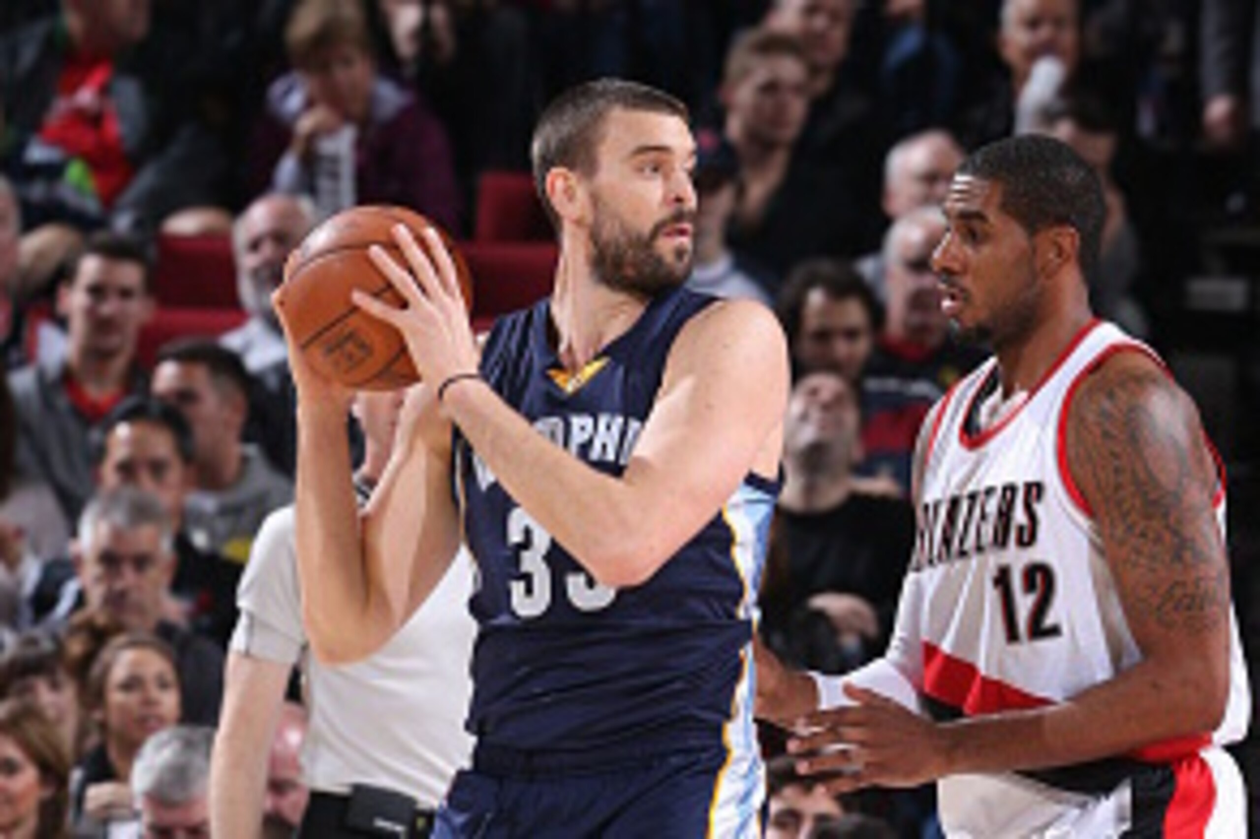 PORTLAND, OR - NOVEMBER 28: Marc Gasol #33 of the Memphis Grizzlies handles the ball against the Portland Trail Blazers on November 28, 2014 at the Moda Center Arena in Portland, Oregon. NOTE TO USER: User expressly acknowledges and agrees that, by downlo