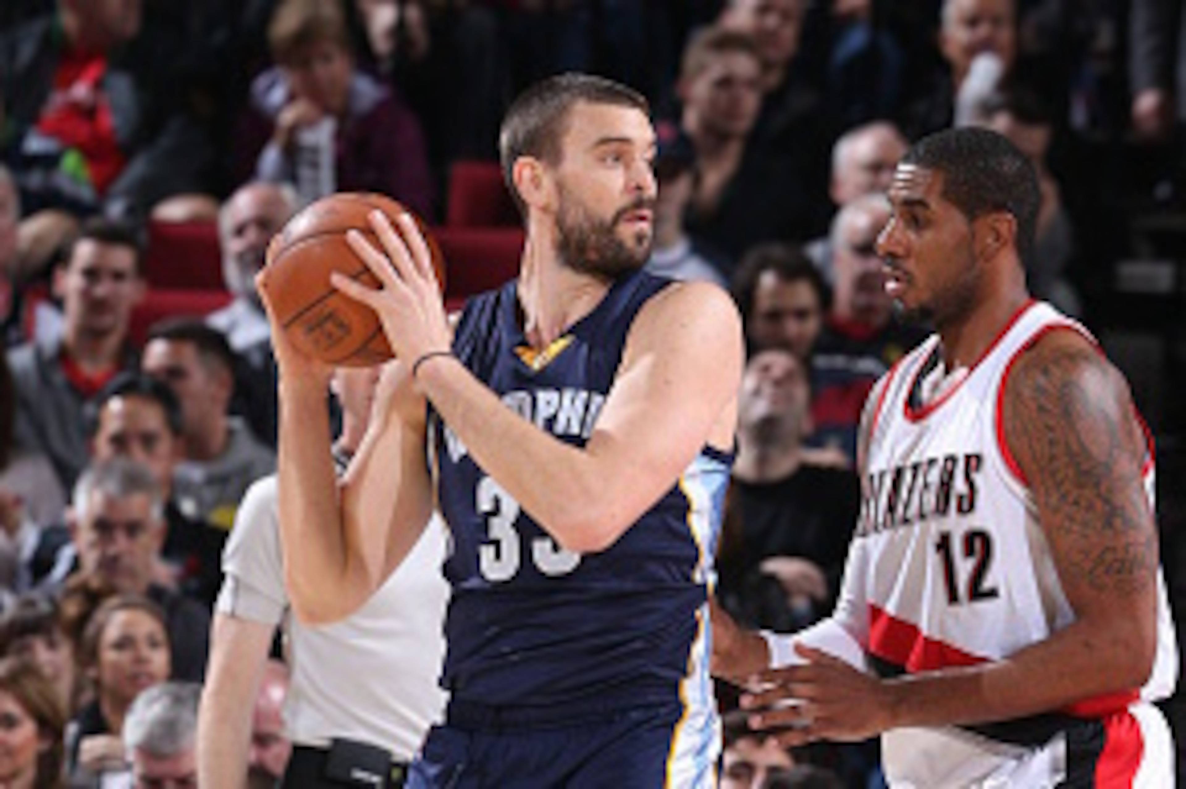 PORTLAND, OR - NOVEMBER 28: Marc Gasol #33 of the Memphis Grizzlies handles the ball against the Portland Trail Blazers on November 28, 2014 at the Moda Center Arena in Portland, Oregon. NOTE TO USER: User expressly acknowledges and agrees that, by downlo