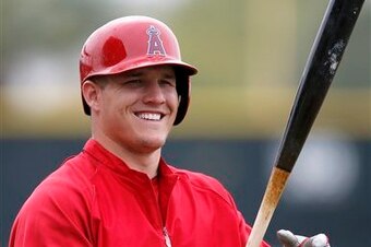 No wonder Mike is smiling: Baseball is just about back.