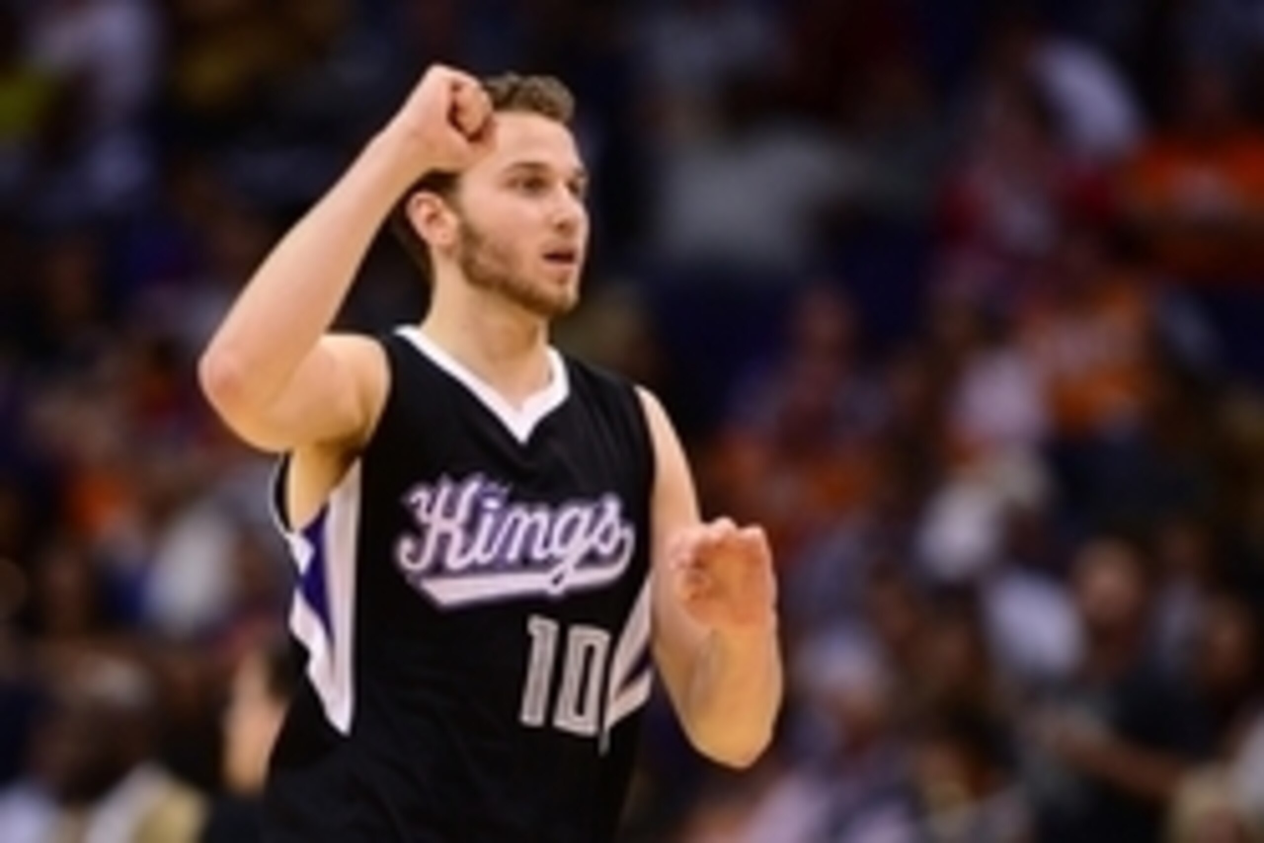 Nov 7, 2014; Phoenix, AZ, USA; Sacramento Kings guard Nik Stauskas (10) reacts after scoring against the Phoenix Suns in the second half at US Airways Center. The Kings won 114-112 in double overtime. Mandatory Credit: Jennifer Stewart-USA TODAY Sports
