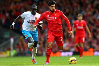 LIVERPOOL, ENGLAND - OCTOBER 25:  Emre Can of Liverpool battles for the ball with Mohamed Diame of Hull City during the Barclays Premier League match between Liverpool and Hull City at Anfield on October 25, 2014 in Liverpool, England.  (Photo by Alex Liv