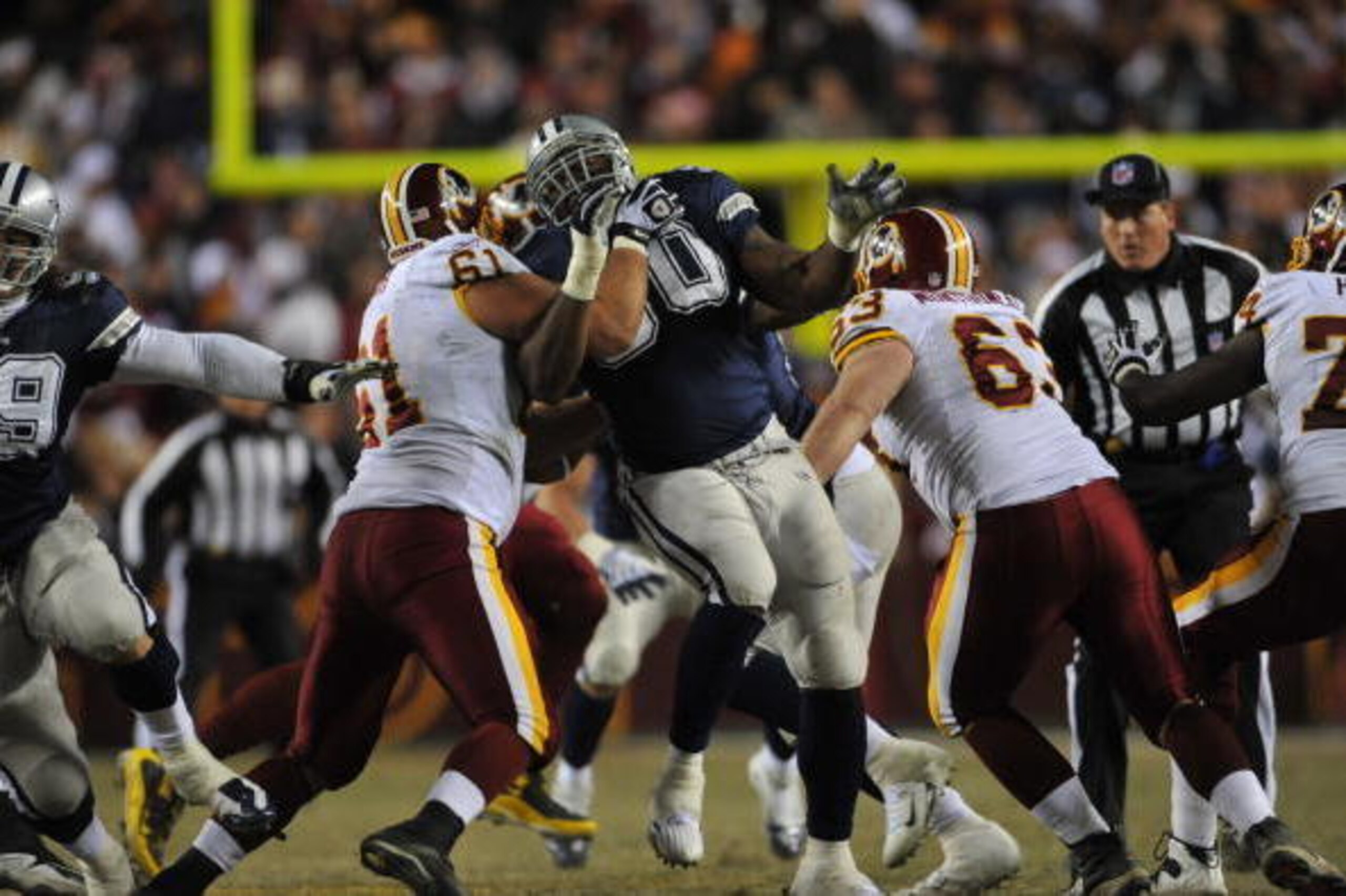 LANDOVER, MD - DECEMBER 27:  Jay Ratliff #90 of the Dallas Cowboys defends against the Washington Redskins at FedExField on December 27, 2009 in Landover, Maryland. The Cowboys defeated the Redskins 17-0. (Photo by Larry French/Getty Images)