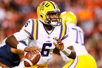AUBURN, AL - OCTOBER 04:  Brandon Harris #6 of the LSU Tigers rolls out of the pocket against the Auburn Tigers at Jordan Hare Stadium on October 4, 2014 in Auburn, Alabama.  (Photo by Kevin C. Cox/Getty Images)