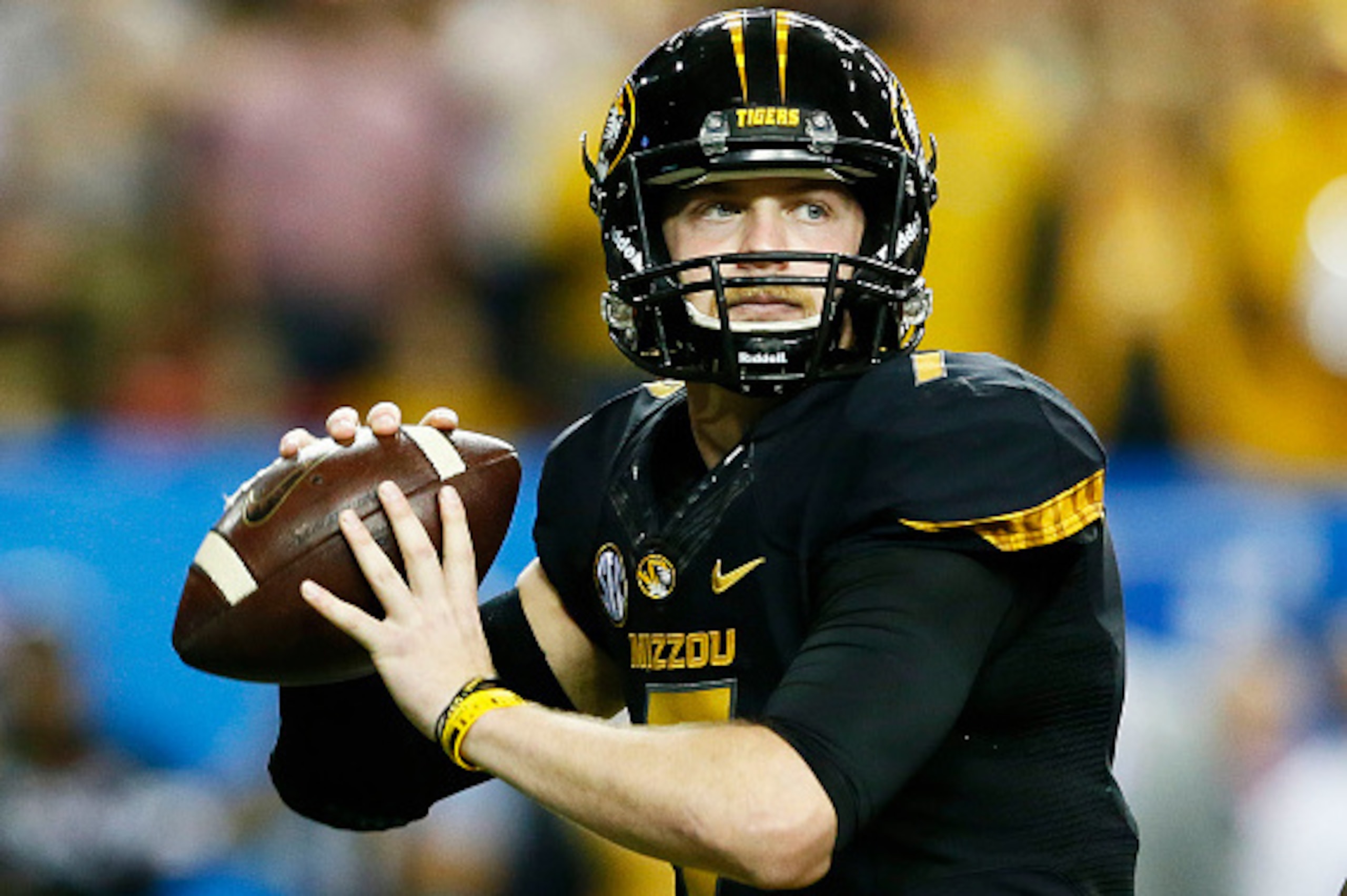 ATLANTA, GA - DECEMBER 06:  Maty Mauk #7 of the Missouri Tigers looks to pass against the Alabama Crimson Tide in the first quarter of the SEC Championship game at the Georgia Dome on December 6, 2014 in Atlanta, Georgia.  (Photo by Kevin C. Cox/Getty Ima