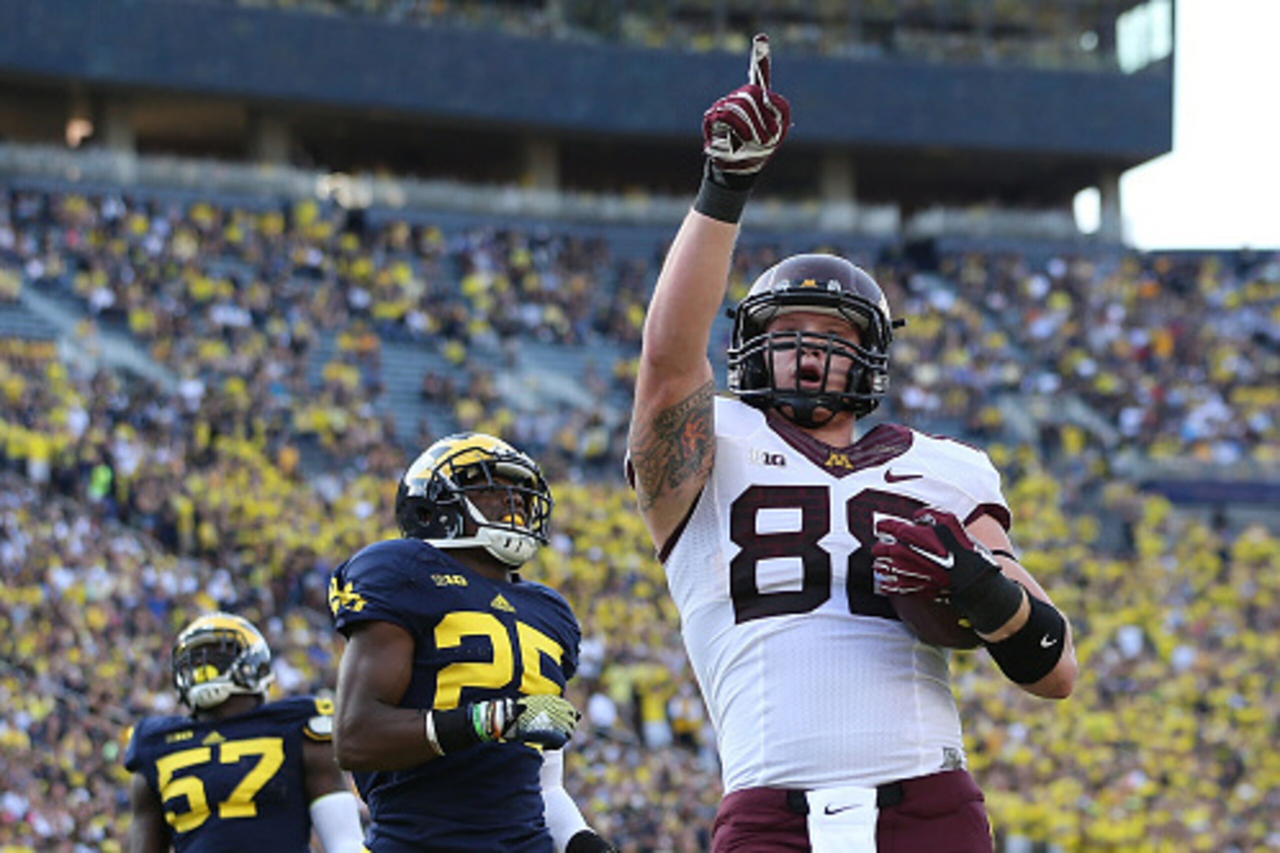 ANN ARBOR, MI - SEPTEMBER 27: Maxx Williams #88 of the Minnesota Golden Gophers celebrates after scoring a one yard touchdown during the third quarter of the game against the Michigan Wolverines at Michigan Stadium on September 27, 2014 in Ann Arbor, Mich