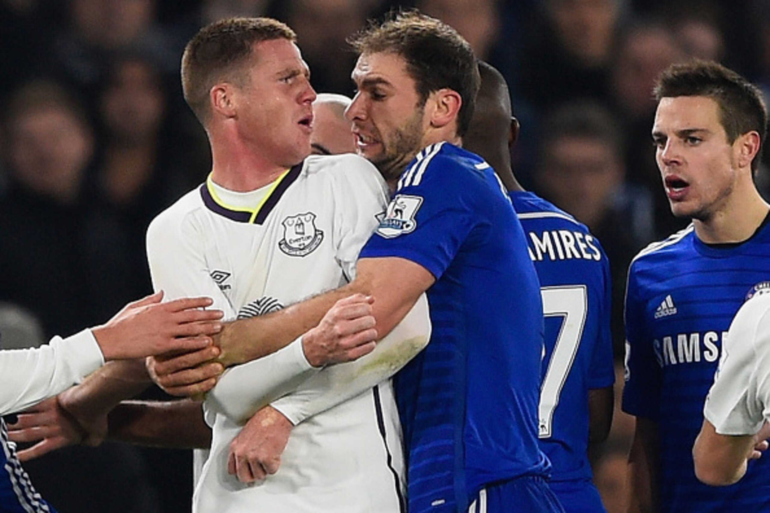LONDON, ENGLAND - FEBRUARY 11:  Branislav Ivanovic of Chelsea clashes with James McCarthy of Everton during the Barclays Premier League match between Chelsea and Everton at Stamford Bridge on February 11, 2015 in London, England.  (Photo by Mike Hewitt/Ge