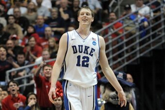 ANAHEIM, CA - MARCH 24:  Kyle Singler #12 of the Duke Blue Devils reacts after a play against the Arizona Wildcats during the west regional semifinal of the 2011 NCAA men's basketball tournament at the Honda Center on March 24, 2011 in Anaheim, California
