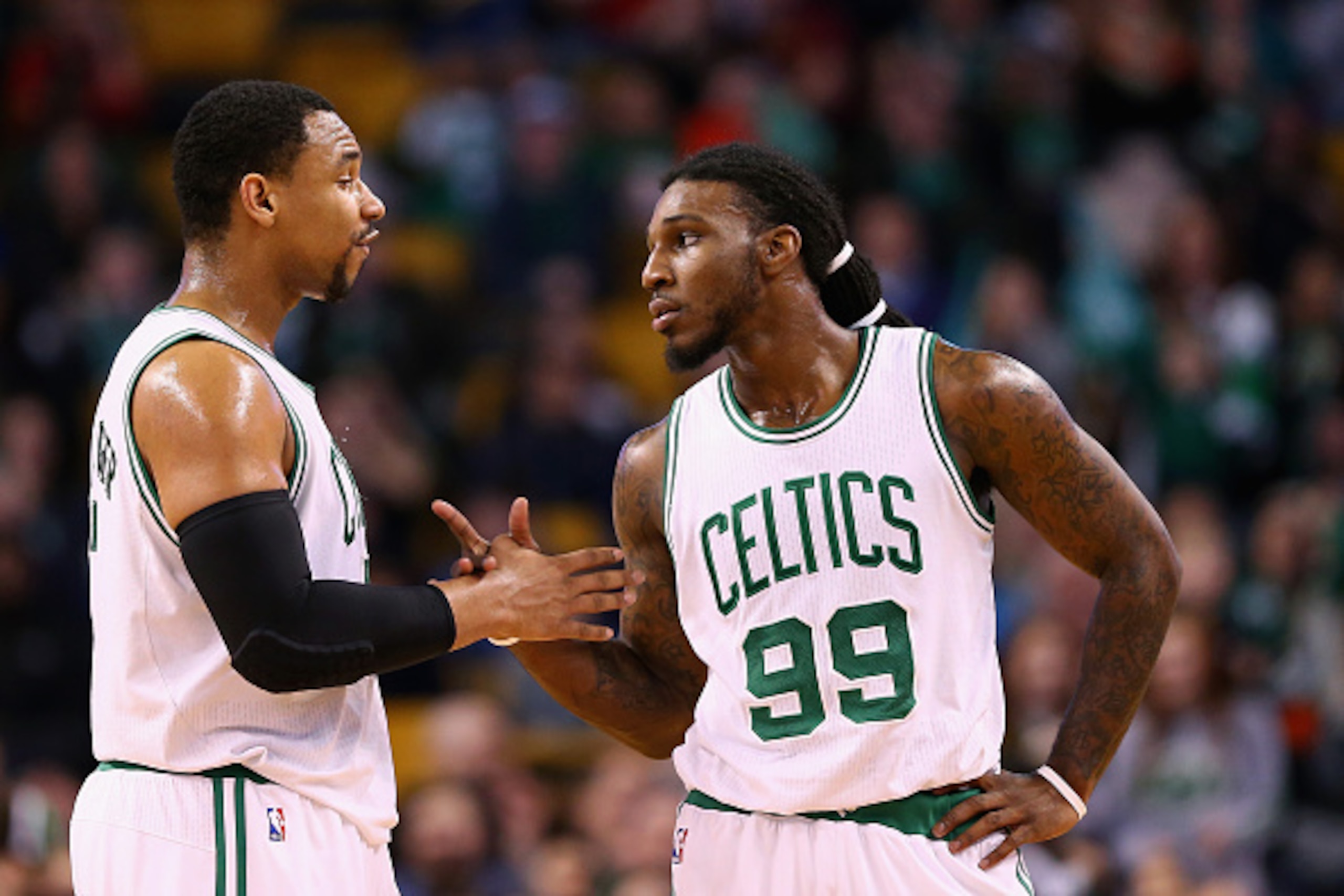 BOSTON, MA - FEBRUARY 06: Jae Crowder #99 talks with Jared Sullinger #7 of the Boston Celtics during the 4th quarter against the Philadelphia 76ers at TD Garden on February 6, 2015 in Boston, Massachusetts. The Celtics defeat the 76ers 107-96. NOTE TO USE
