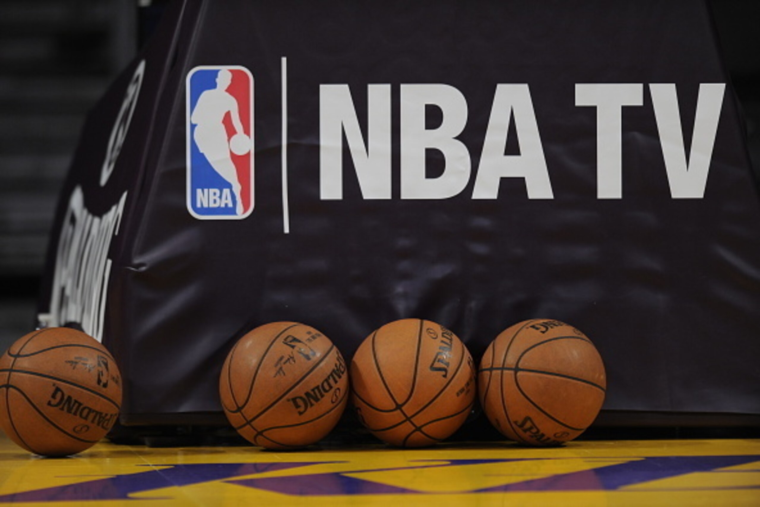 LOS ANGELES, CA - JANUARY 15: The Official Adam Silver Basketballs sit next to the NBA TV logo before a game between the Cleveland Cavaliers and Los Angeles Lakers at STAPLES Center on January 15, 2015 in Los Angeles, California. NOTE TO USER: User expres
