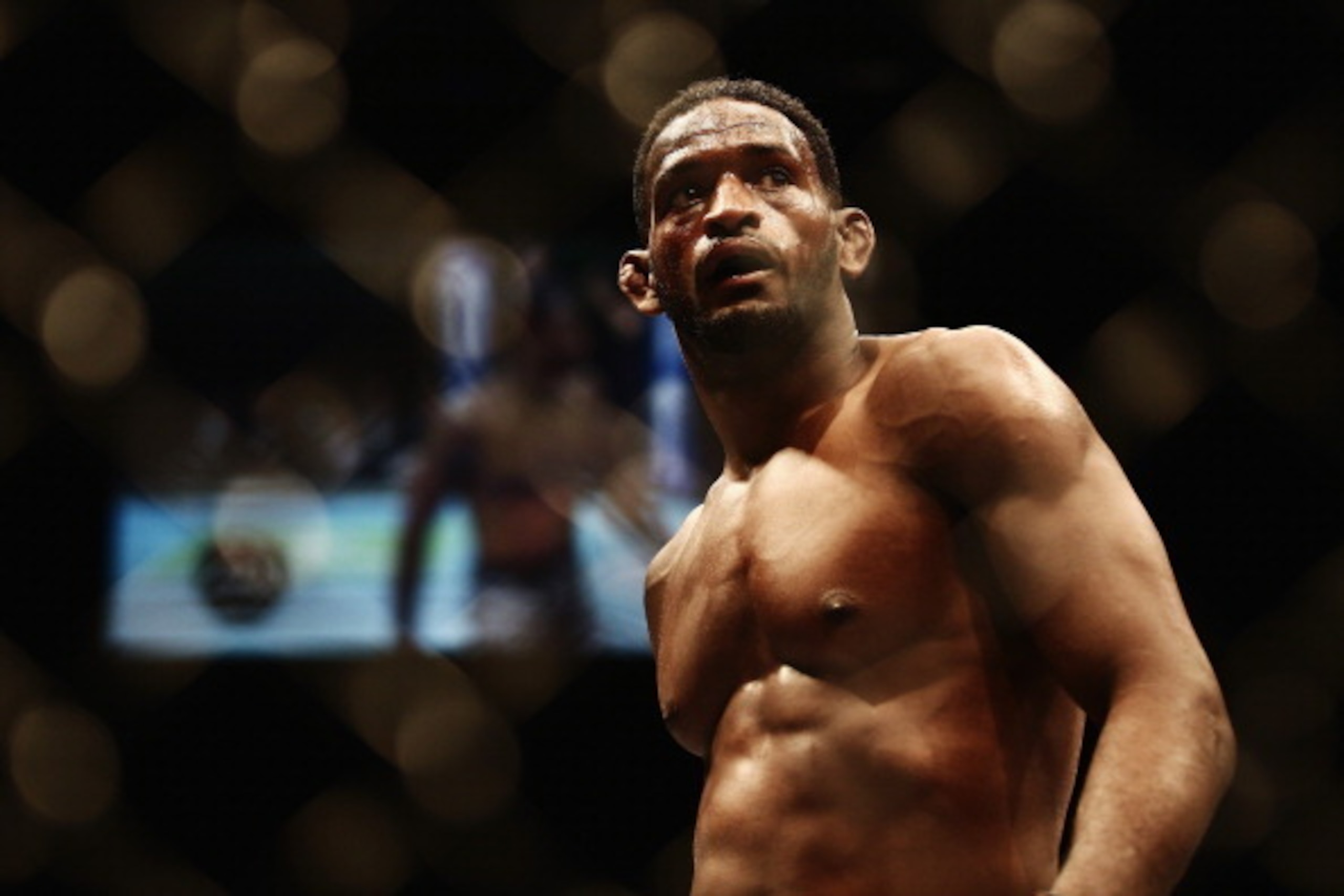 AUCKLAND, NEW ZEALAND - JUNE 28:  Neil Magny of USA celebrates after winning the UFC Welterweight bout between Neil Magny of USA and Rodrigo De Lima of Brazil on June 28, 2014 in Auckland, New Zealand.  (Photo by Hannah Peters/Getty Images)