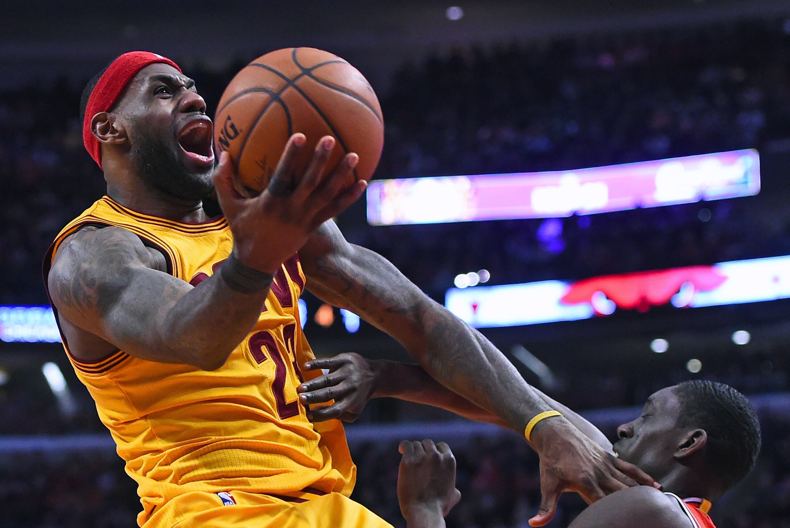 Feb 12, 2015; Chicago, IL, USA; Cleveland Cavaliers forward LeBron James (23) shoots the ball against Chicago Bulls forward Tony Snell (20) during the second half at the United Center. The Chicago Bulls defeat the Cleveland Cavaliers 113-98. Mandatory Cre