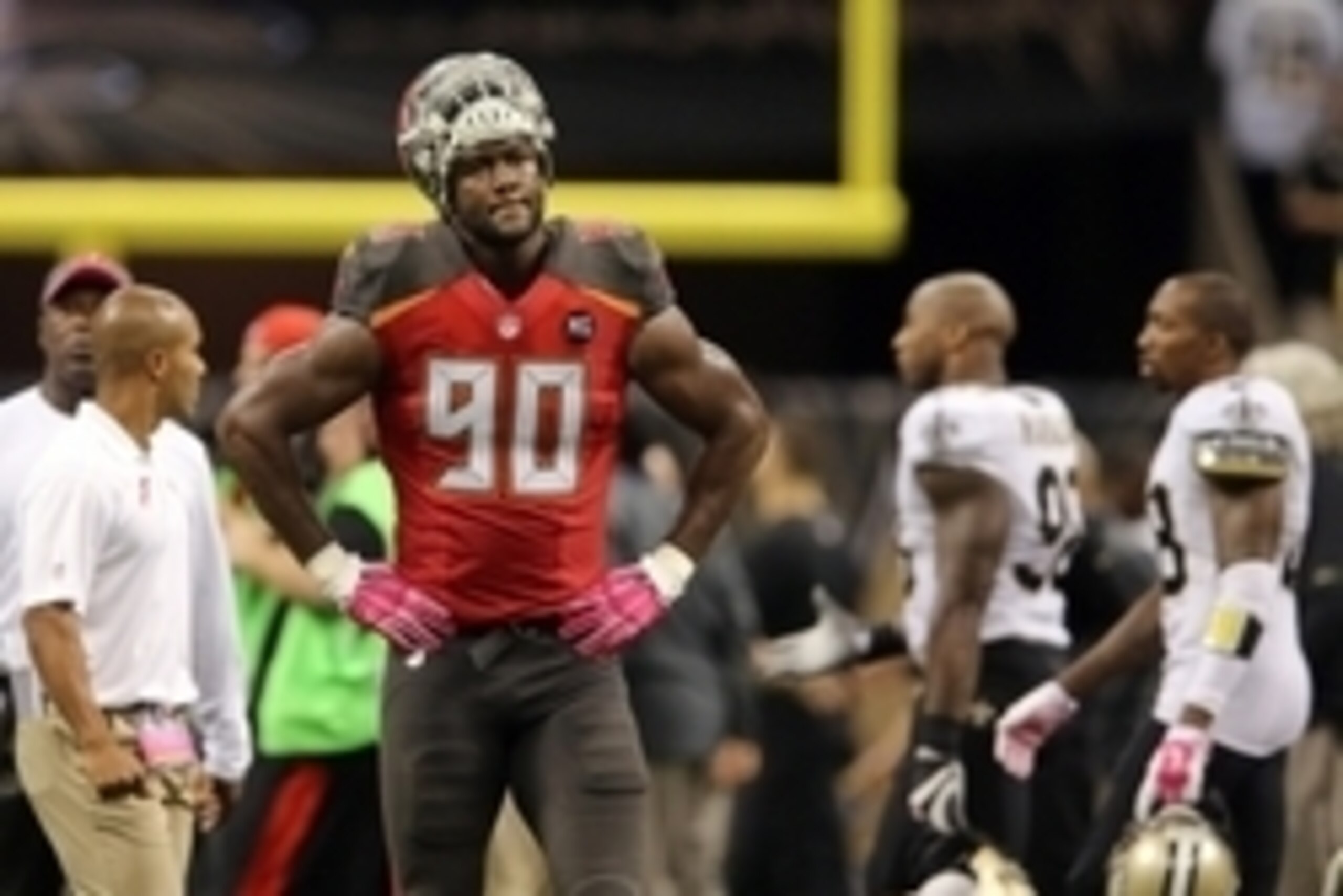 Oct 5, 2014; New Orleans, LA, USA; Tampa Bay Buccaneers defensive end Michael Johnson (90) walks off the field after the New Orleans Saints scored a touchdown in overtime at the Mercedes-Benz Superdome to win 37-31. Mandatory Credit: Chuck Cook-USA TODAY 