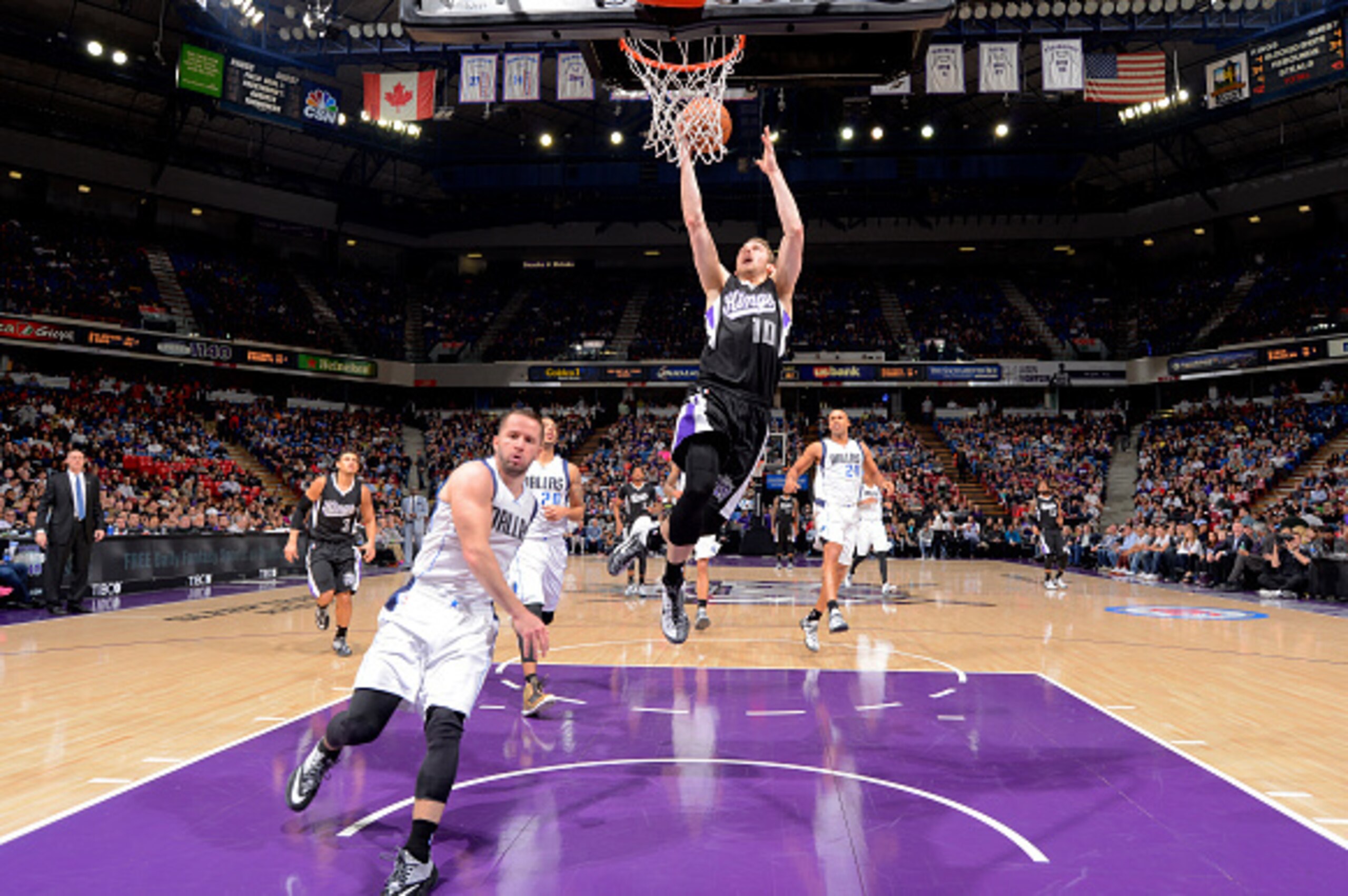 SACRAMENTO, CA - FEBRUARY 5: Nik Stauskas #10 of the Sacramento Kings shoots a layup against the Dallas Mavericks on February 5, 2015 at Sleep Train Arena in Sacramento, California. NOTE TO USER: User expressly acknowledges and agrees that, by downloading
