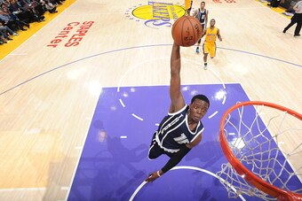 LOS ANGELES, CA - DECEMBER 19: Reggie Jackson #15 of the Oklahoma City Thunder dunks against the Los Angeles Lakers on December 19, 2014 at STAPLES Center in Los Angeles, California. NOTE TO USER: User expressly acknowledges and agrees that, by downloadin